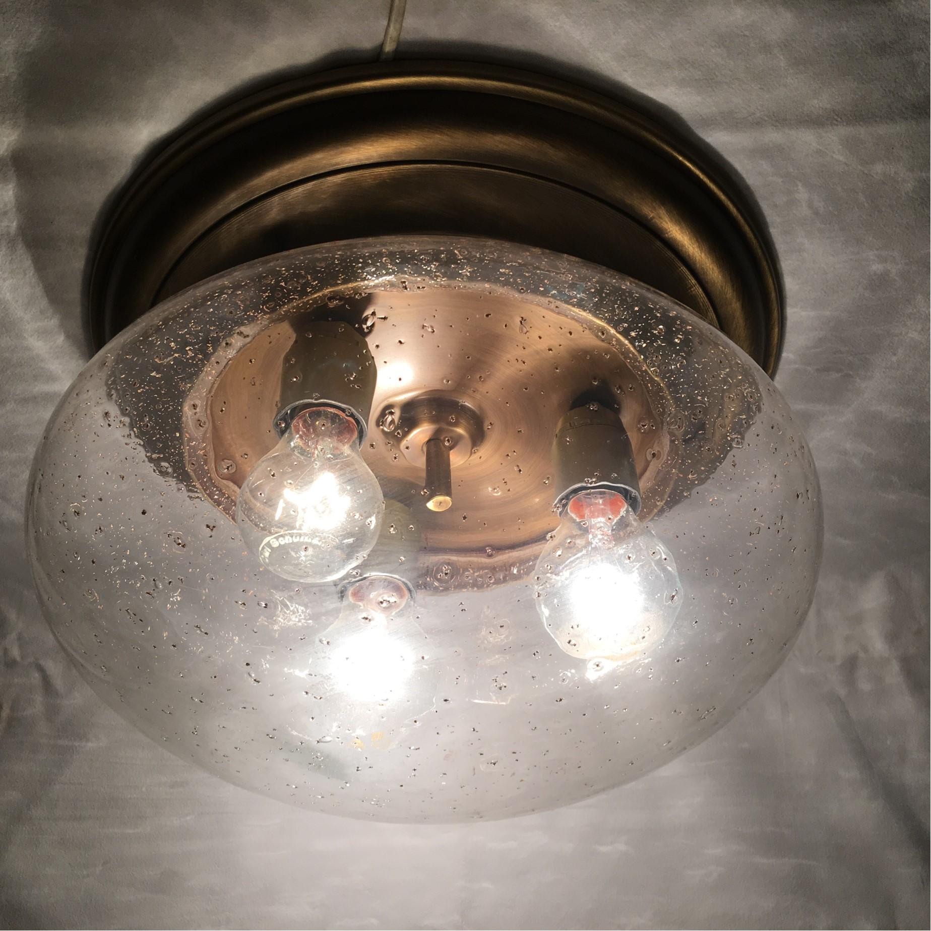 Decorated with small glass melding in the dome this pretty brass and glass dome flush mount lamp is rewired to meet US Standards. It requires 3 E27 European Edison bulbs for a beautiful lighting effect.