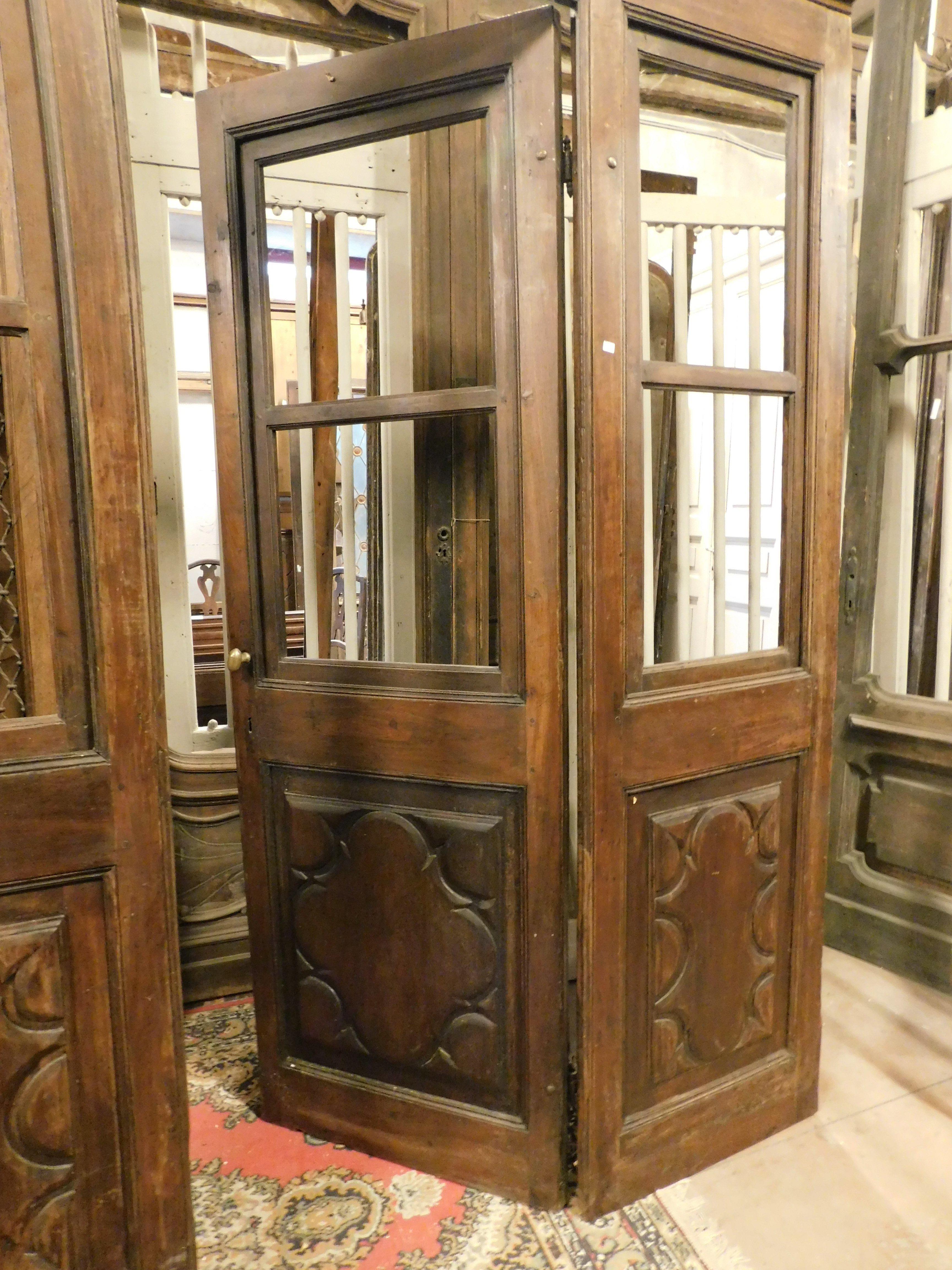 Glass entrance shop door with windows, carved walnut and complete frame, Italy In Good Condition For Sale In Cuneo, Italy (CN)