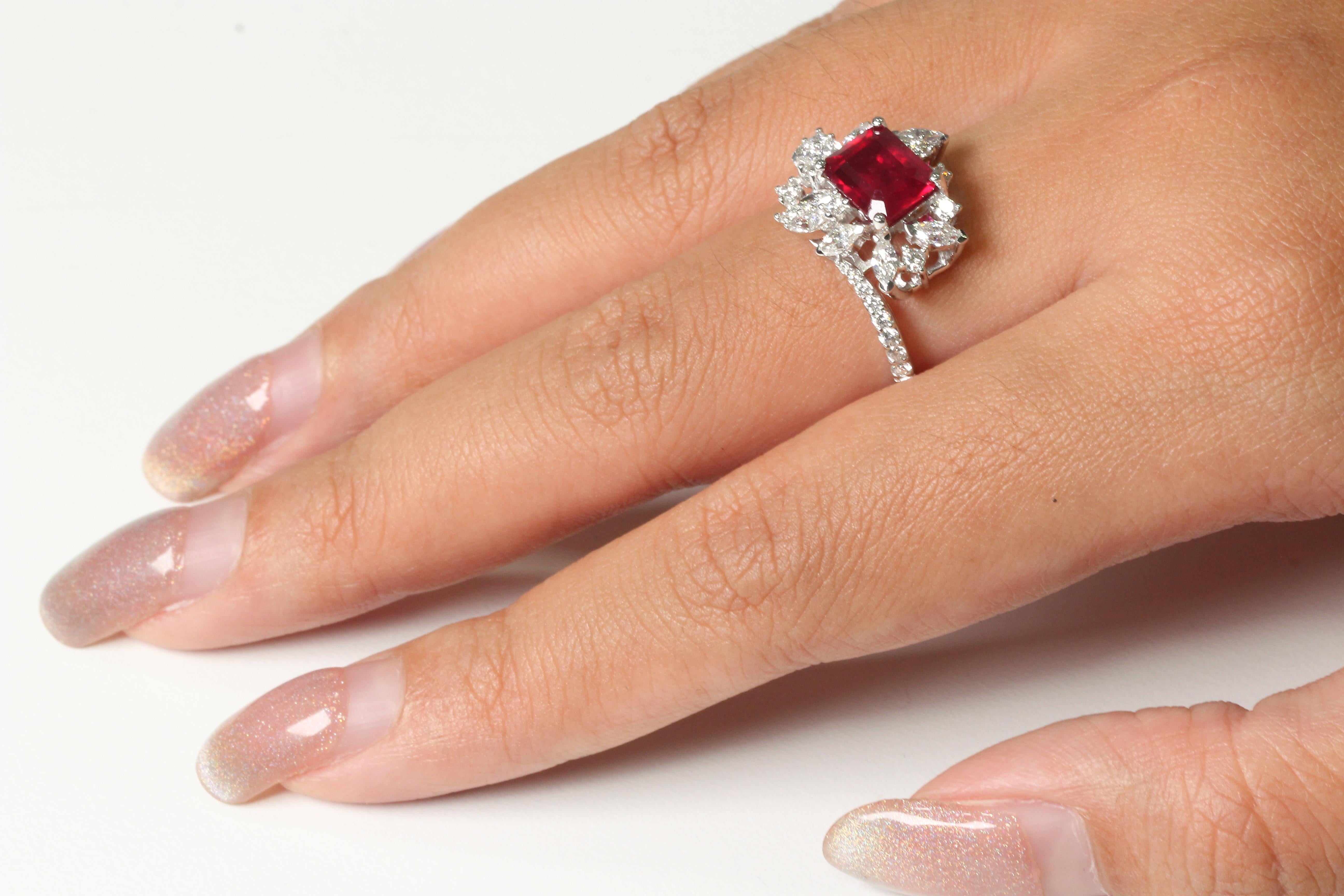 You may be sure to catch everyone's attention with this ring. A glass filled ruby stone and diamond stones are put in an antique style setting in this item. The mix of these materials, as well as the ring's design, set it out from the crowd and make