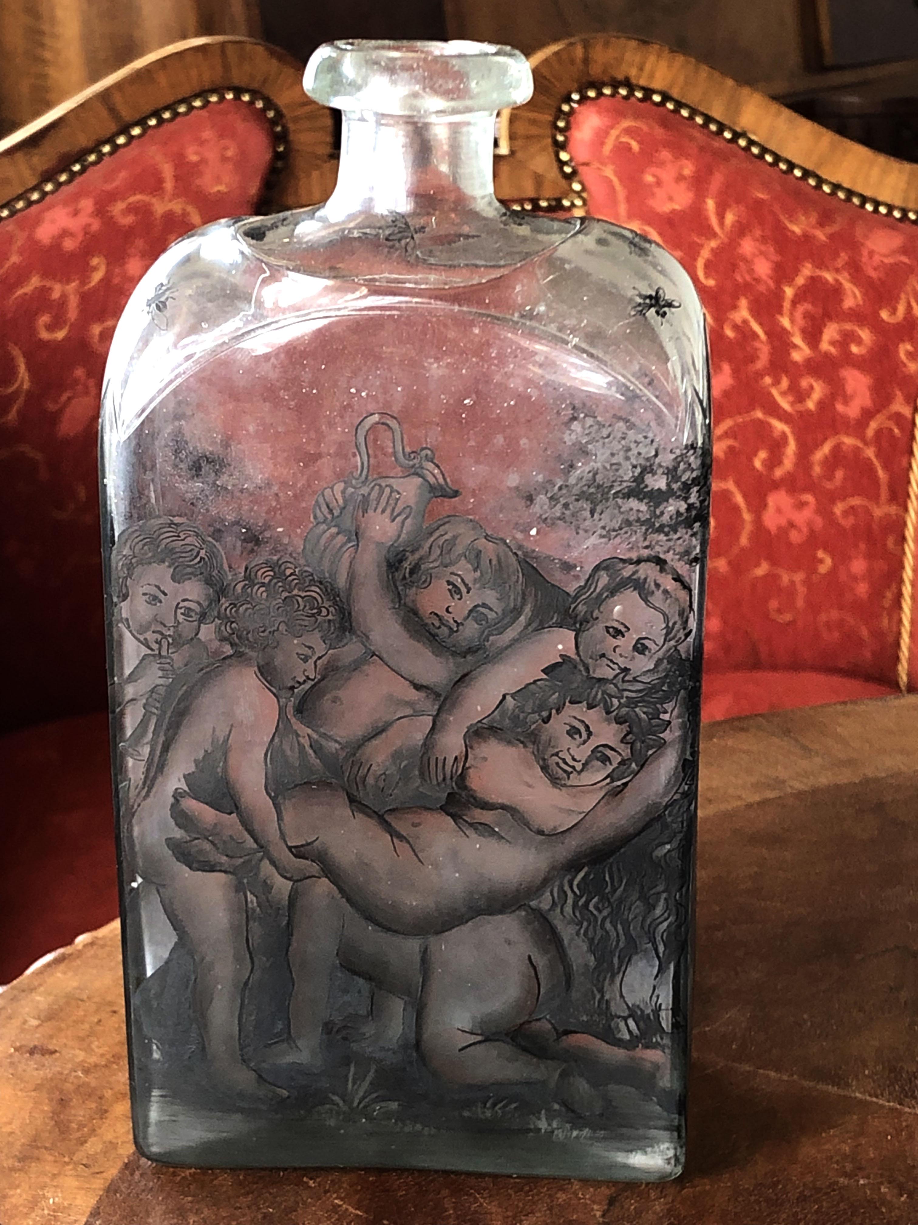 This flask is an example of the beautiful work of the old glass masters. The use of transparent enamels to decorate glass vessels was an important German innovation. It was probably enameled by Ignaz Preissler (1676-1741), (Not confirmed unsigned.)