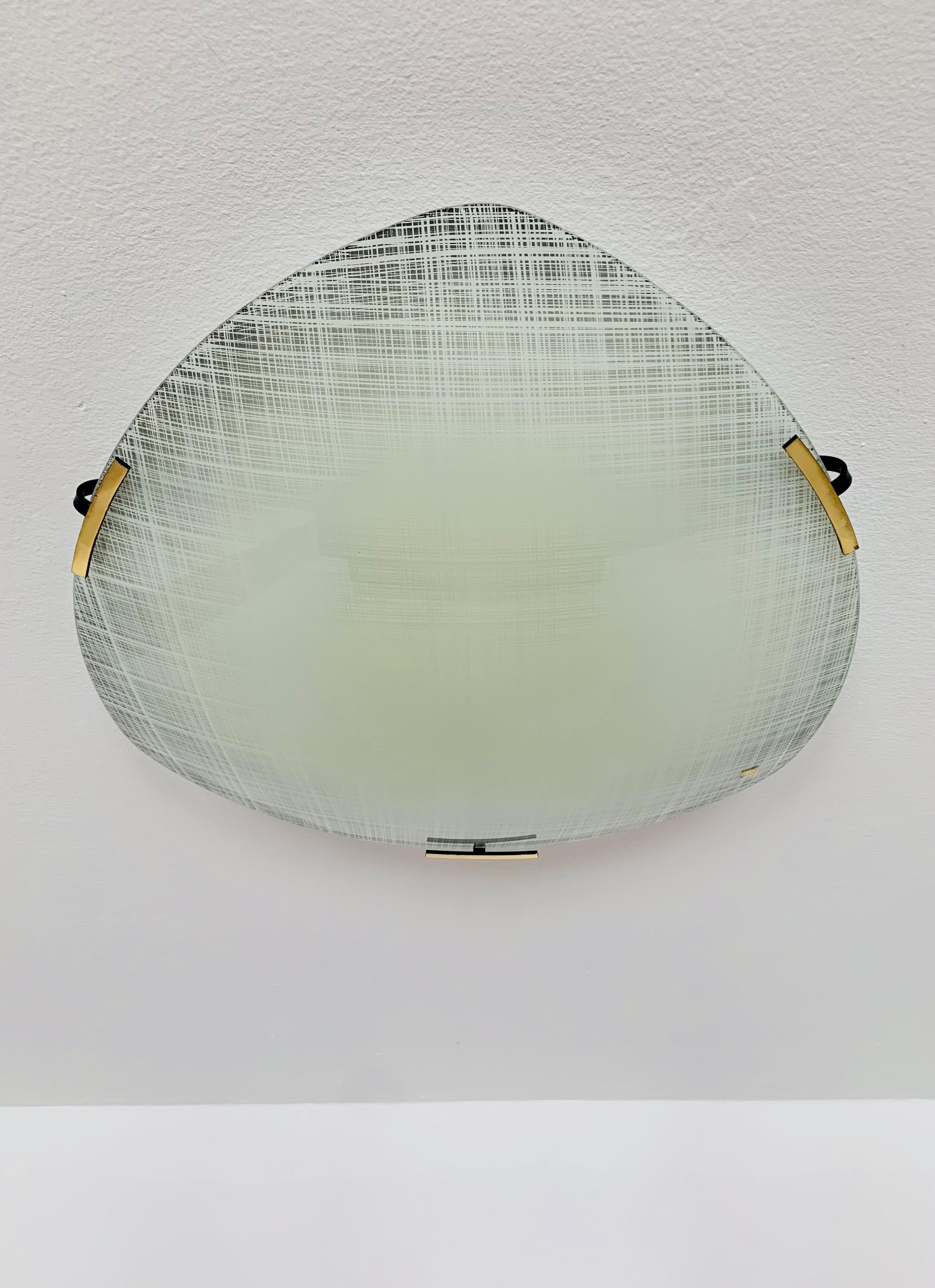 Exceptionally beautiful ceiling lamp from the 50s.
Very fine and beautiful design that fits wonderfully into any room.
A very elegant light is created.

Manufacturer: Doria

Condition:

Very good vintage condition with slight signs of age-related