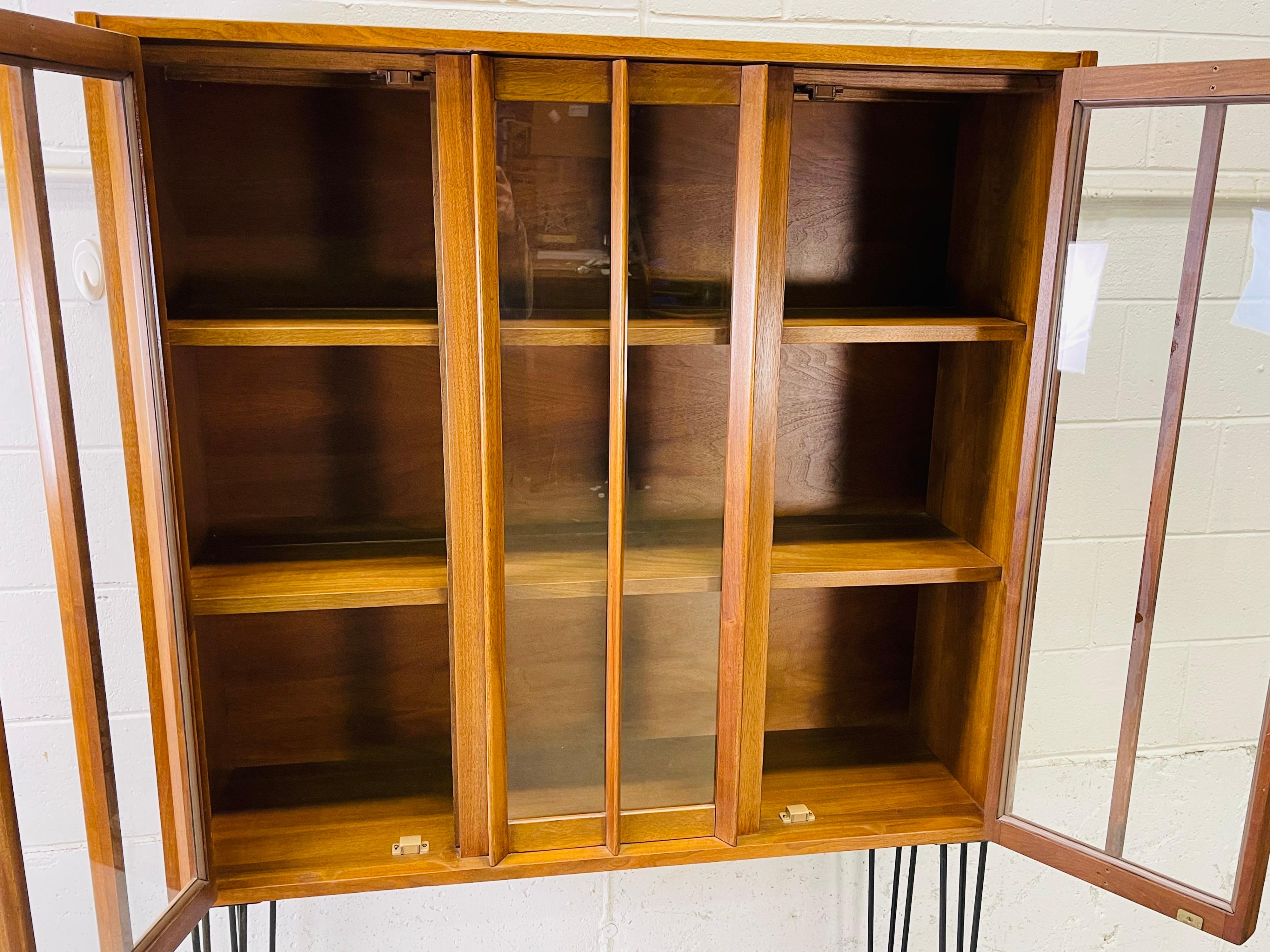 Mid-Century Modern Glass Front Cabinet with Iron Hairpin Legs For Sale