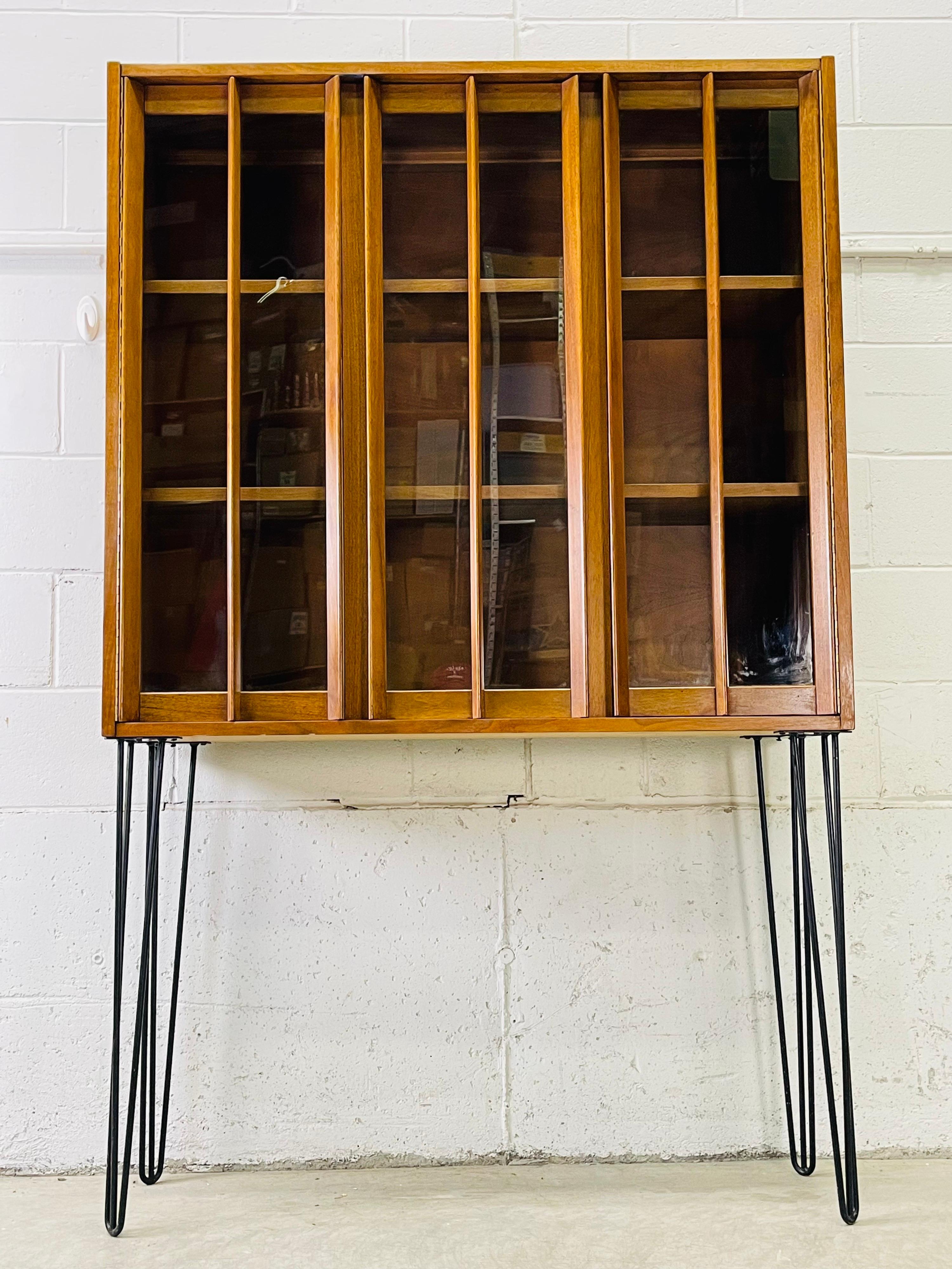 20th Century Glass Front Cabinet with Iron Hairpin Legs For Sale