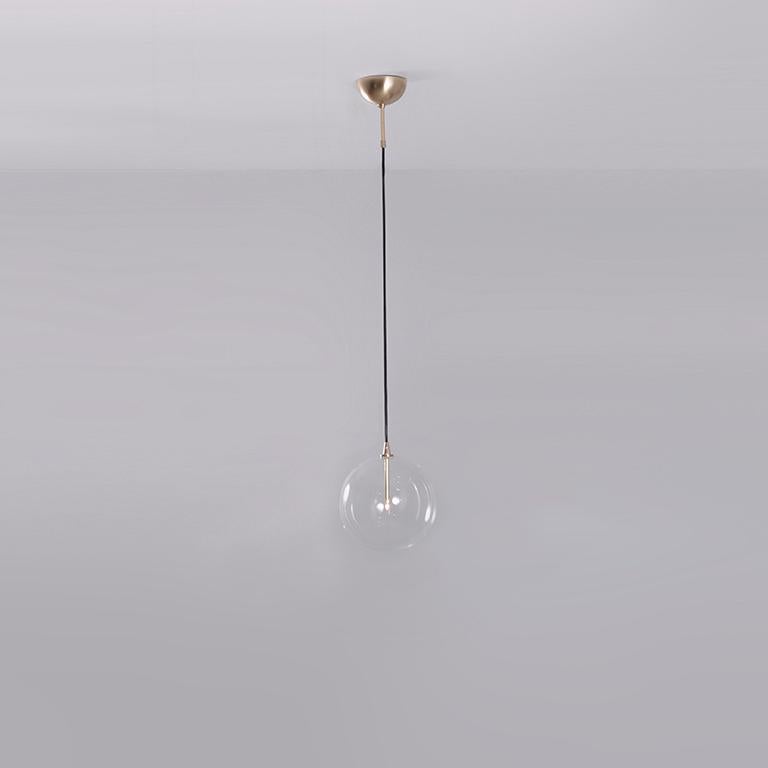 Glass globe 30 pendant light by Schwung
Dimensions: W 30 x D 30 x H 349 cm
Materials: Natural brass, hand blown glass globes

Finishes available: Black gunmetal, polished nickel


Schwung is a German word, and loosely defined, means energy or