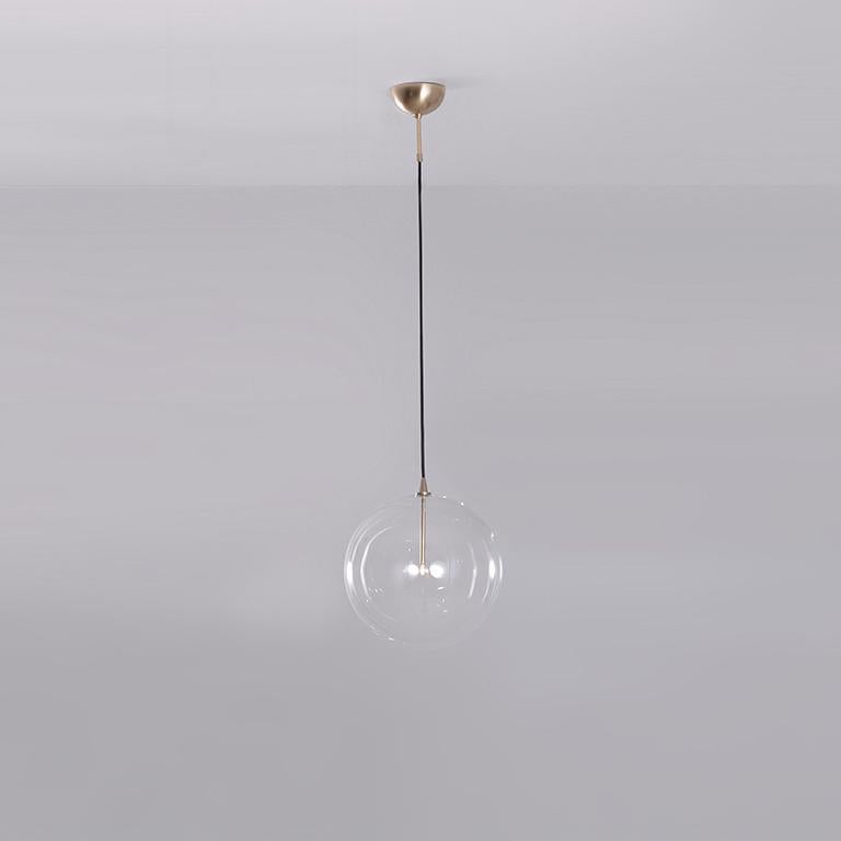 Glass globe 35 pendant light by Schwung
Dimensions: W 35 x D 35 x H 354 cm
Materials: Natural brass, hand blown glass globes

Finishes available: Black gunmetal, polished nickel


Schwung is a German word, and loosely defined, means energy or