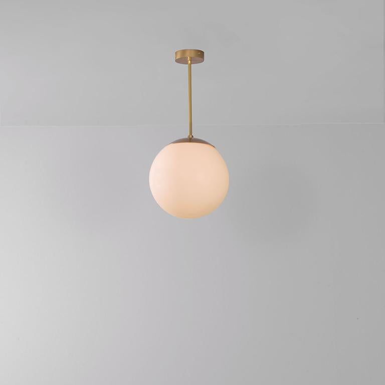 Glass globe opal 30 pendant light by Schwung
Dimensions: W 30 x D 30 x H 65 cm
Materials: Natural brass, hand blown glass globes



Schwung is a German word, and loosely defined, means energy or momentum of a positive manner. Synonyms: Verve, zest,