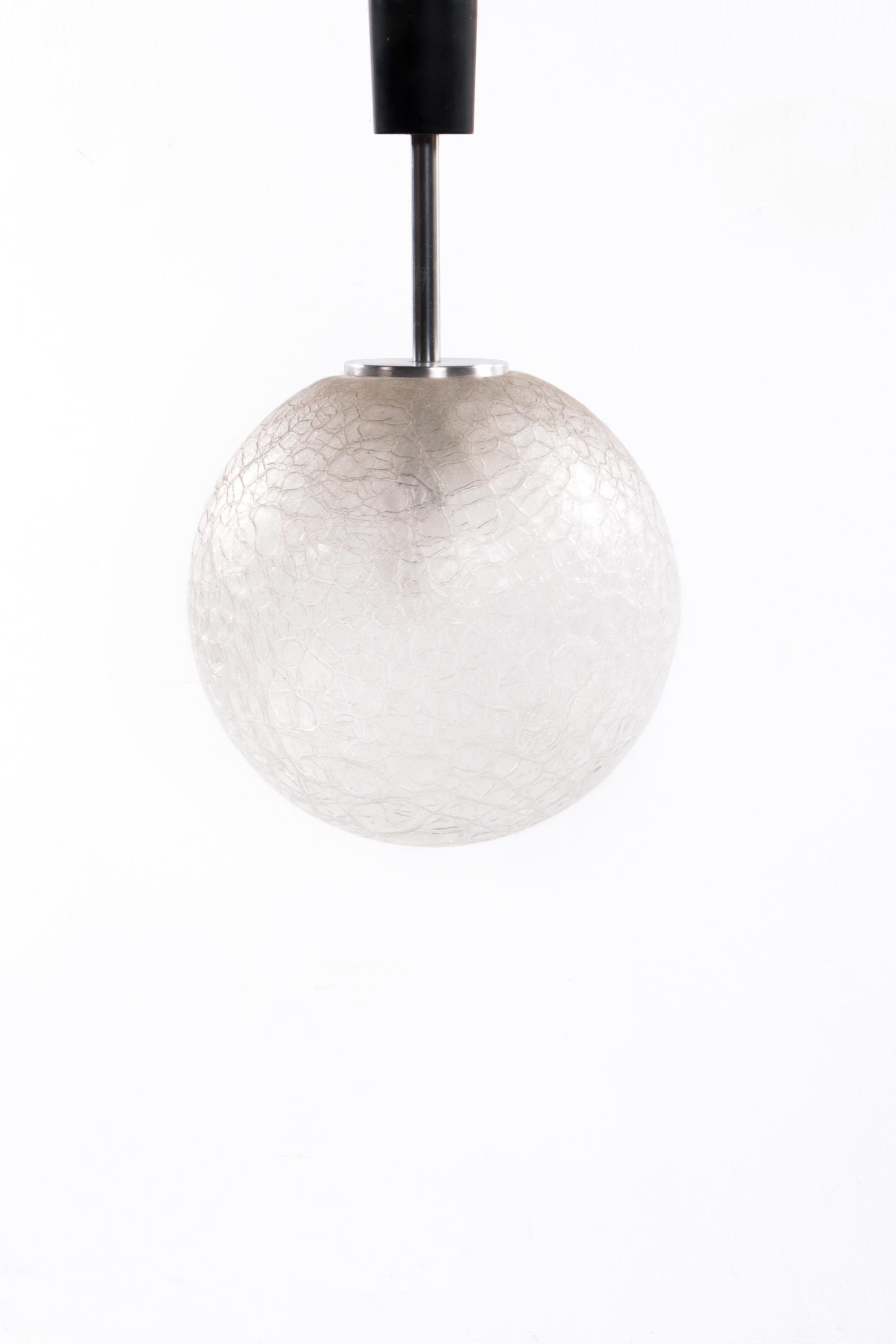 Glass Globe pendant lamp by Doria Leuchten, 1970s
Nice stylish light object, fits perfectly in a sleek modern interior with a lot of daylight with a few 'eye catchers' here and there, whether or not also in 'Ice Glass'.

Period: 1960s -