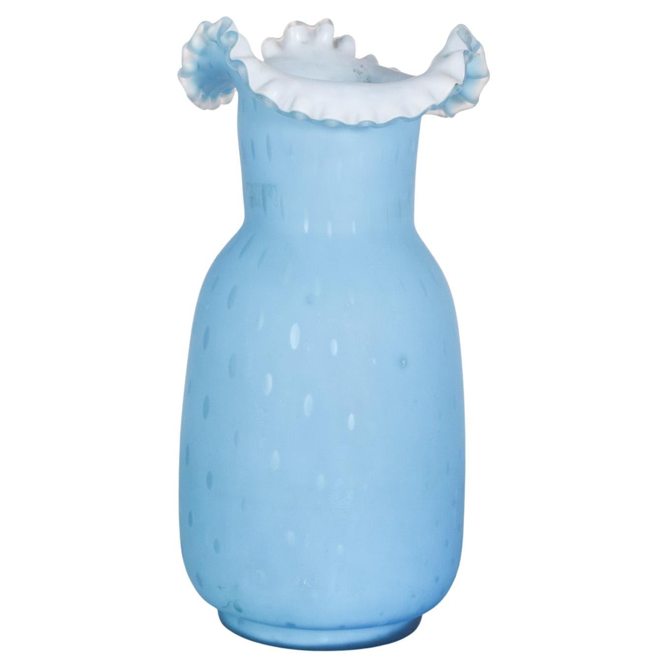 Tarro de cristal con boca ondulada, decoración monocromática en azul en venta