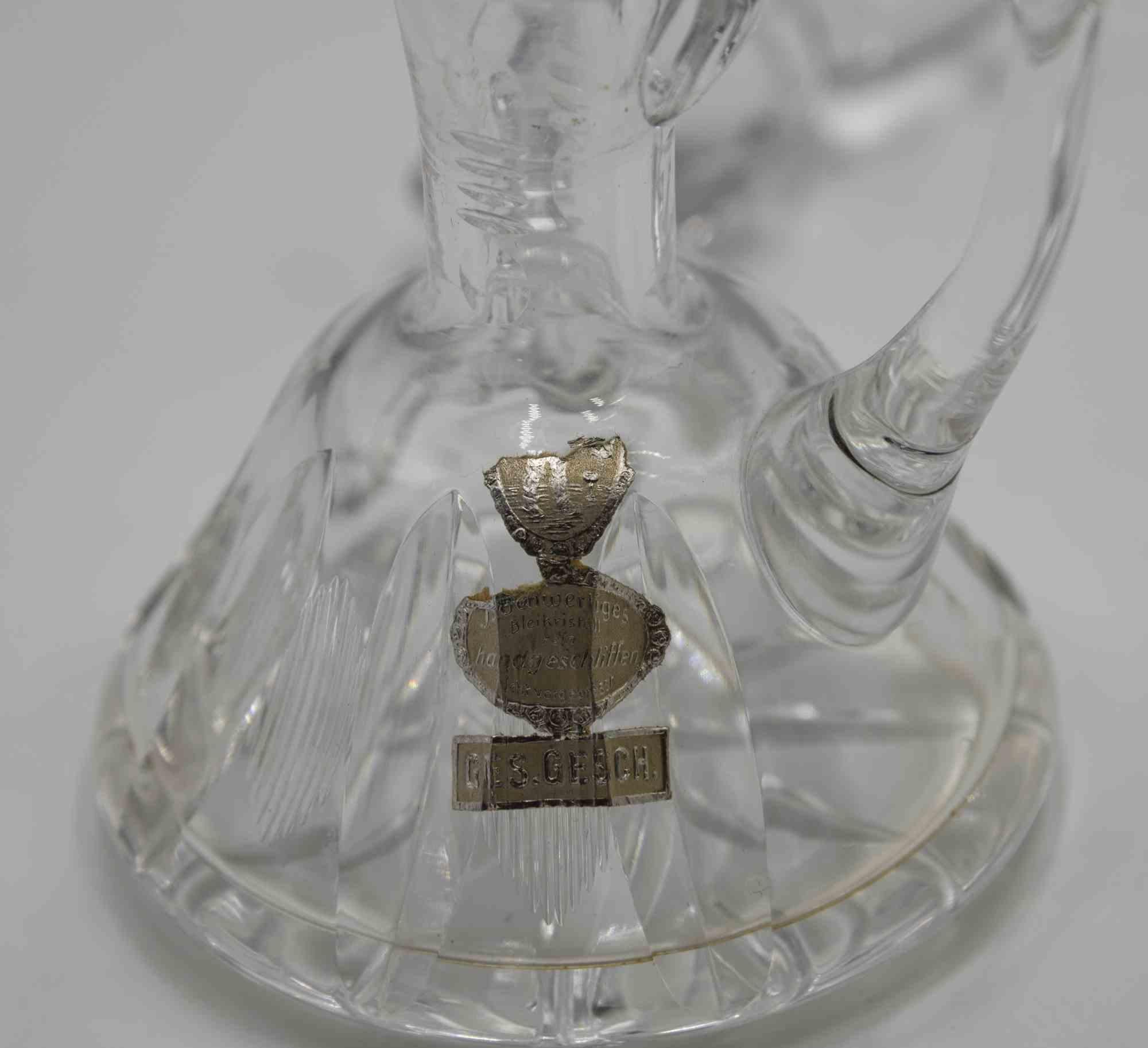Glass little oil-jug is an decorative object realized in the 1970s.

Art glass elegant little oil-jug perfect for your table.

Produced by German manufacturing as reported on the label.
