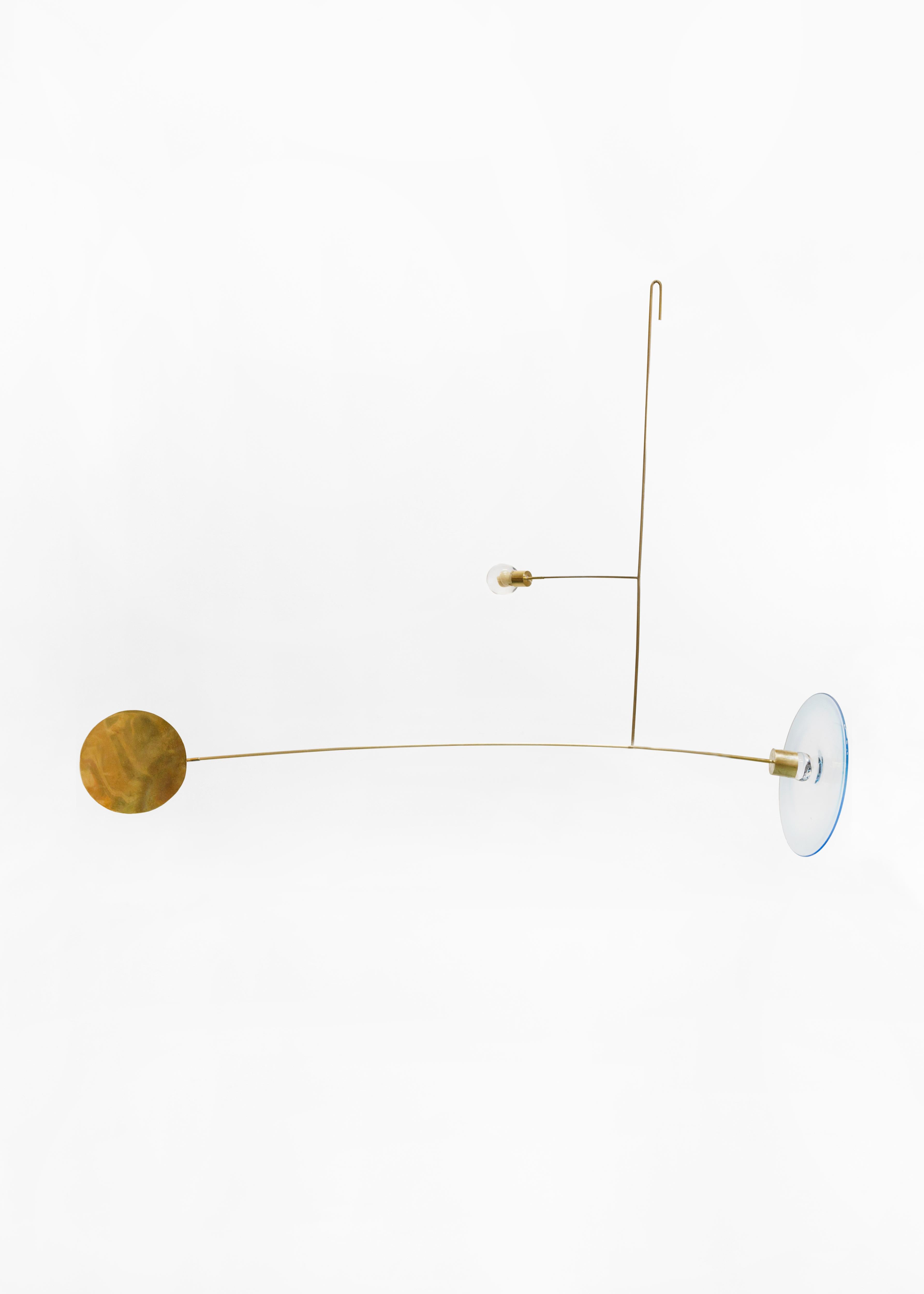 Glass mobile No. 86 - by Milla Vaahtera

Dimensions: 800 x 300 x 700cm
Weight: 300g

Dialogue is a series of mobiles and stabiles made of free-blown glass and hand-worked brass.

Vaahtera began to work on this series in May 2017 together with