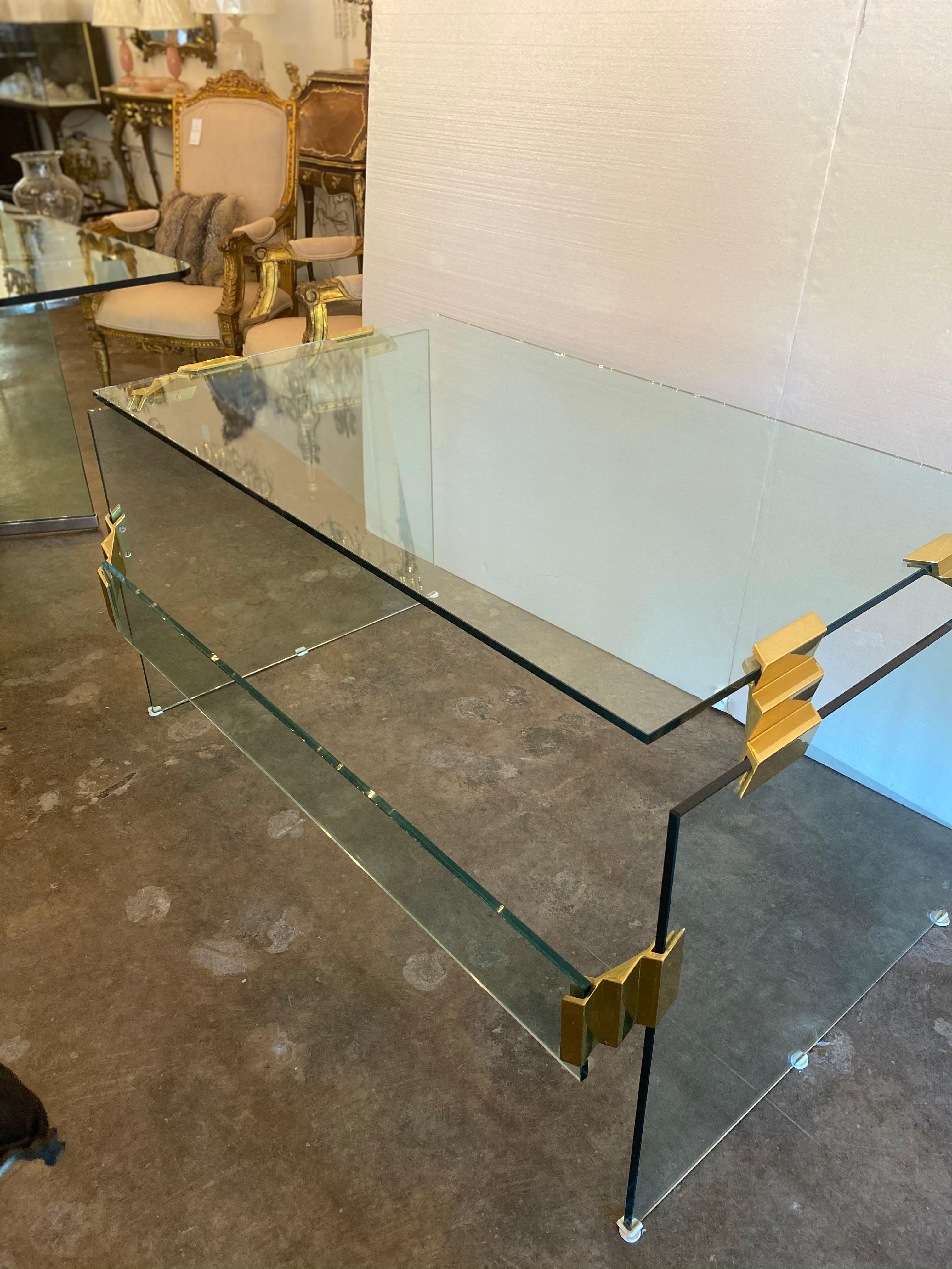 Glass modern desk with gold-plated decorative plates, beautifully designed, gold plated plates gives it that elegant and vintage look.