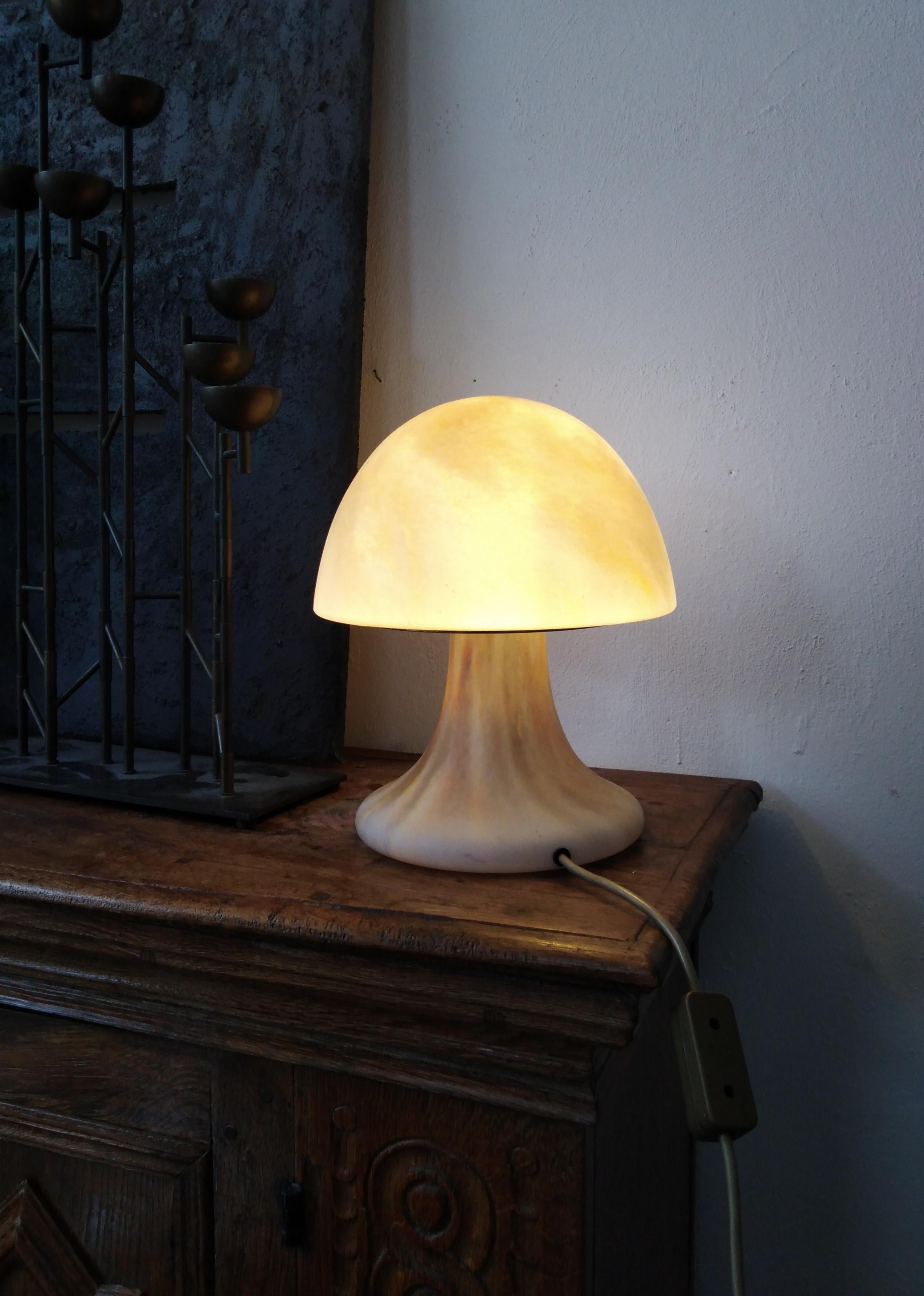 High decorative glass table lamp by Glashütte Limburg from germany 70s.
The lamp makes a warm light. The lamp is in a very good condition.