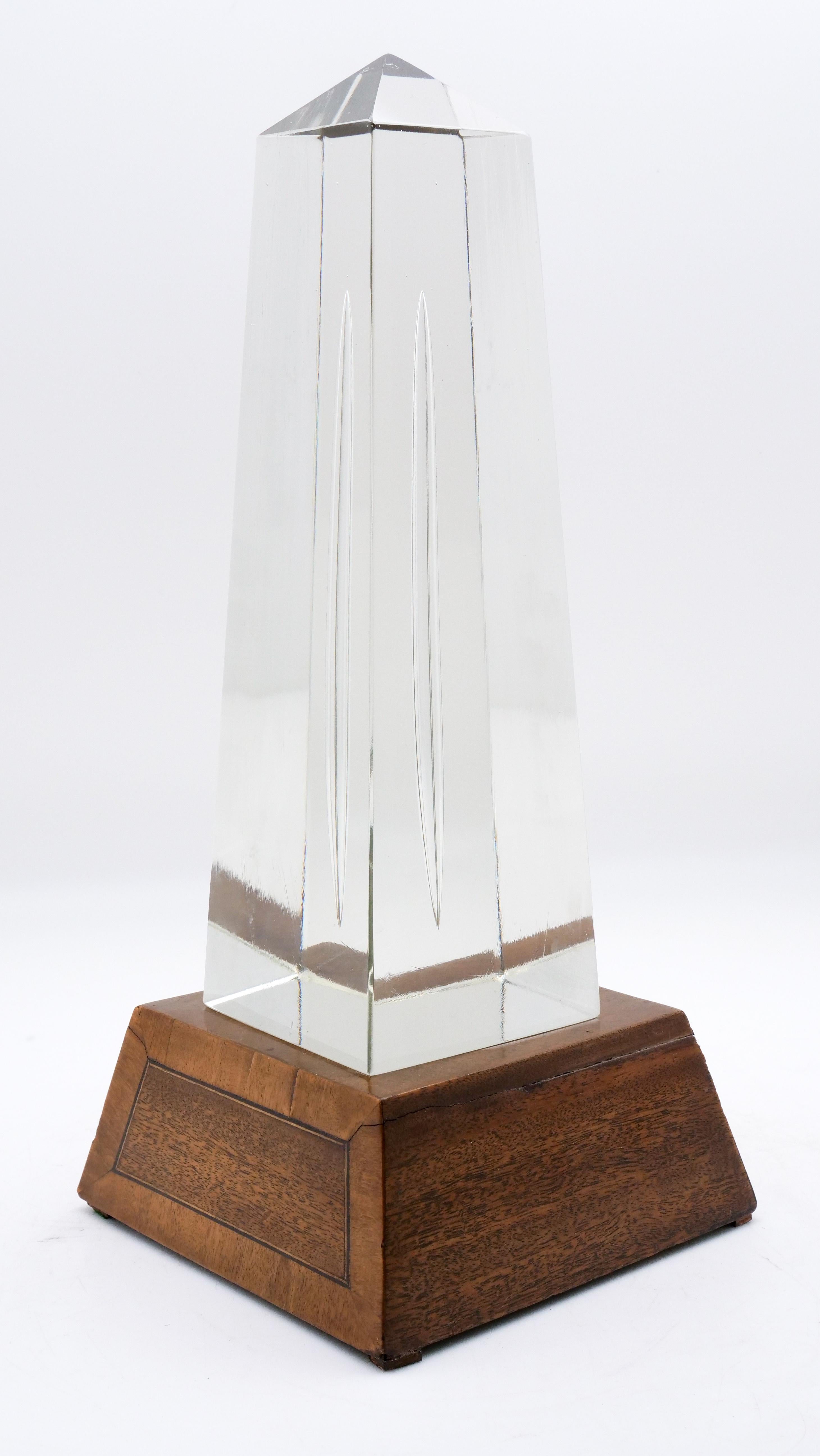 Glass obelisk with mahogany stand, circa 1830, English (2 separate pieces).
