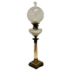 Antique Glass Oil Lamp on Marble Column with a Stepped Brass Base