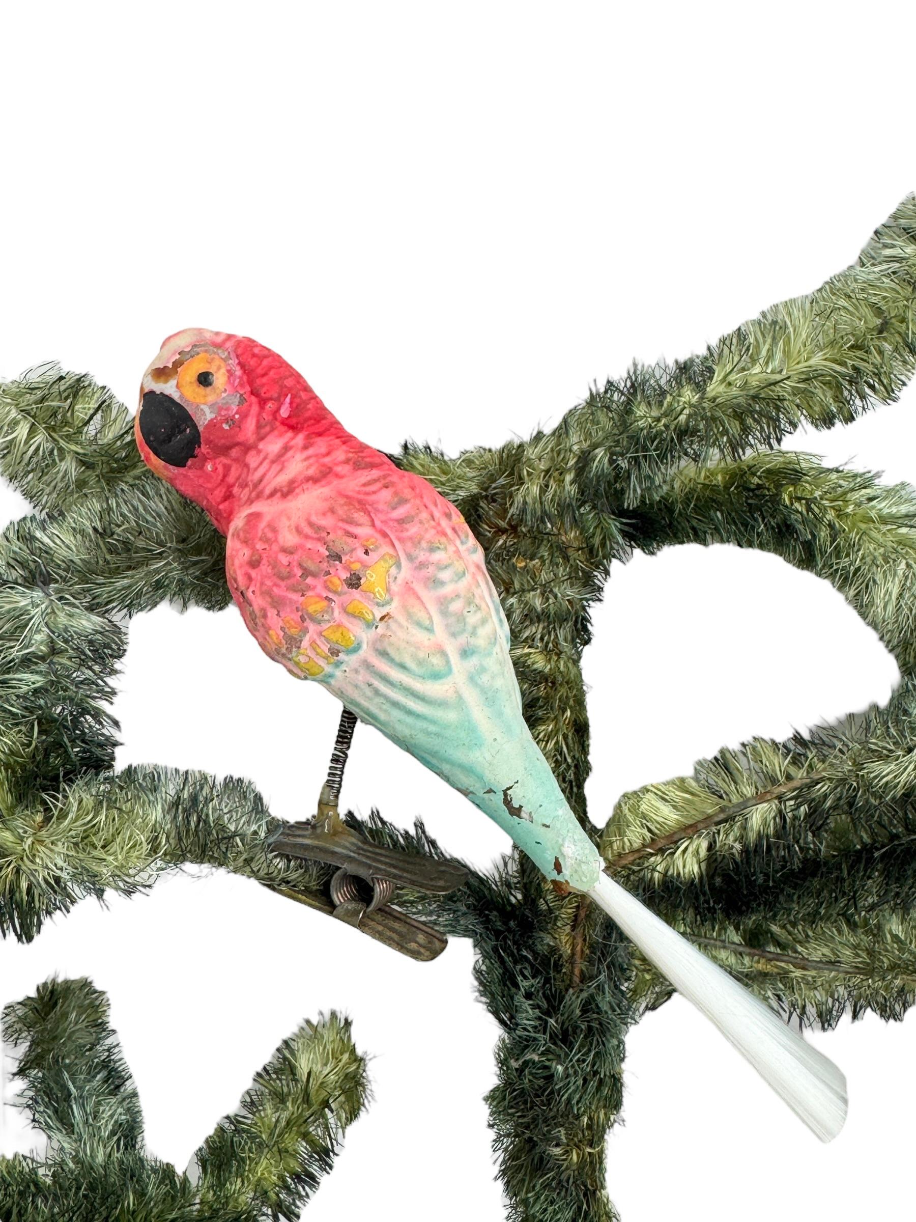 A rare antique clip-on bird ornament, it's a beautiful parrot. This ornament, is made from ultra-thin hand blown glass, hand painted with a kind of cold paint, would be a great antique addition for your Christmas, feather tree or sitting on a