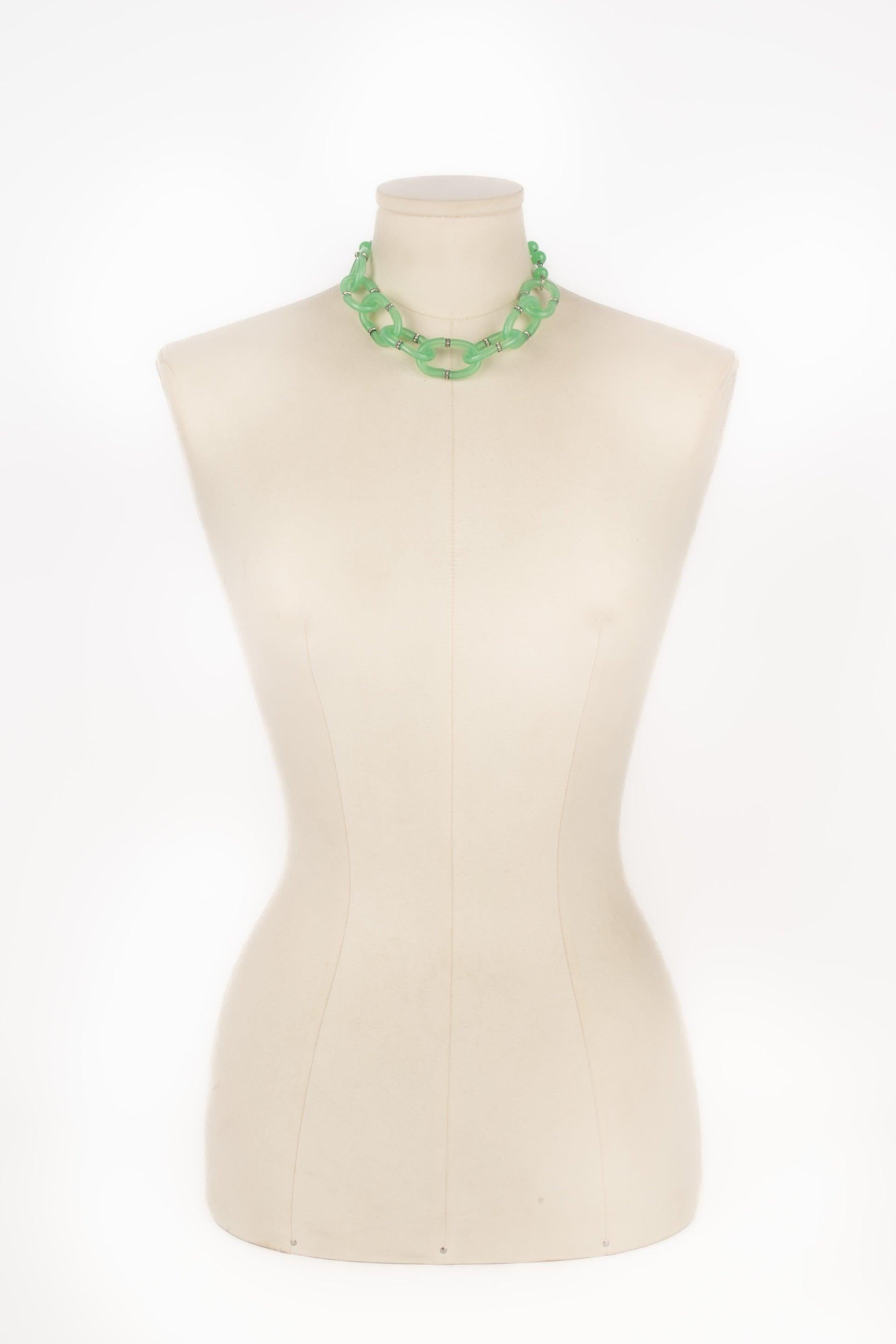 Glass paste necklace with silvery metal and rhinestones. Jewelry from the 1930s.

Additional information:
Condition: Very good condition
Dimensions: Length: 41 cm

Seller Reference: BC73