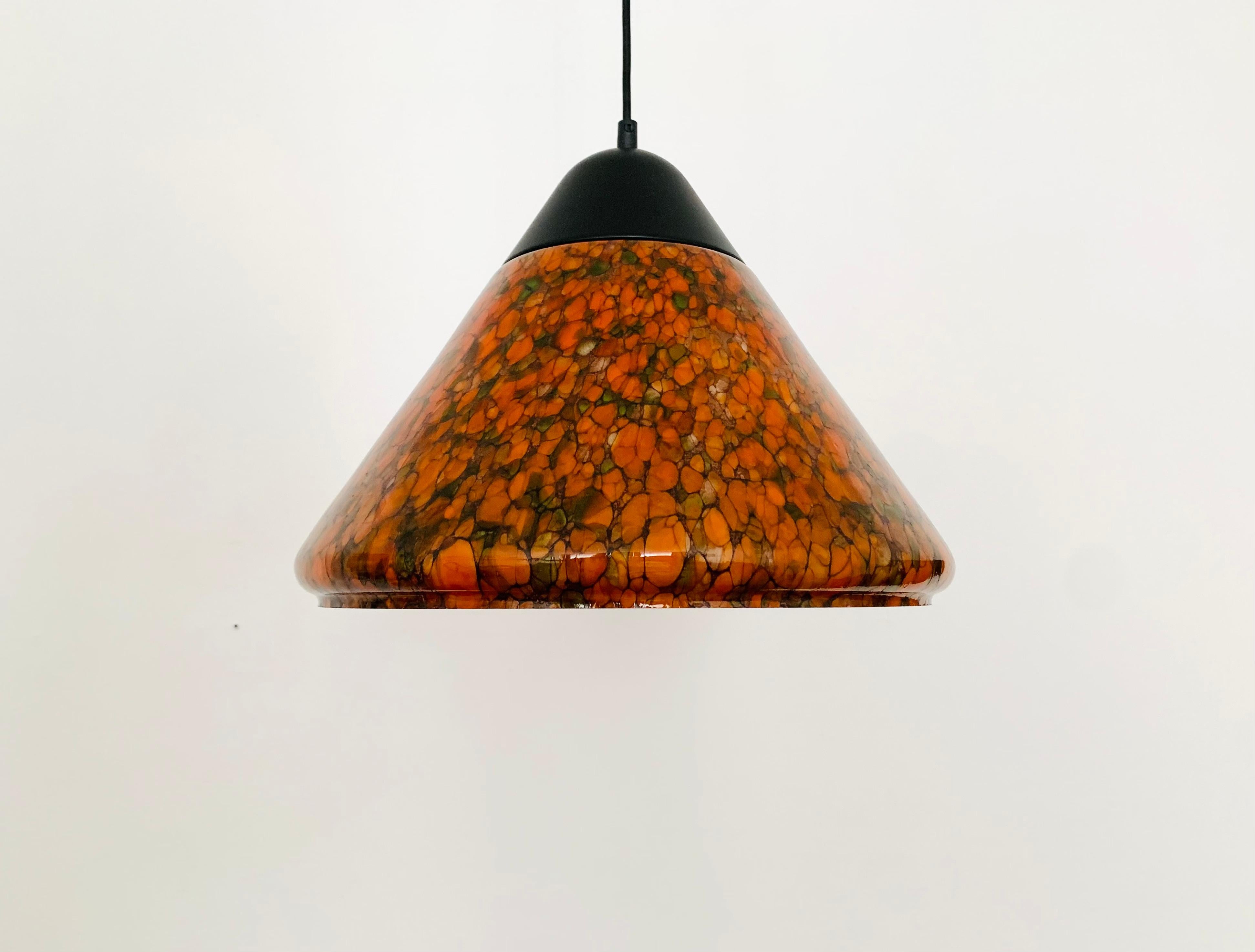 Exceptionally beautiful glass lamp from the 1980s.
Very fine and beautiful design which fits wonderfully into any room.
The high-quality glass creates a beautiful and very comfortable light.

Manufacturer: Peill and Putzler

Condition:

Very good