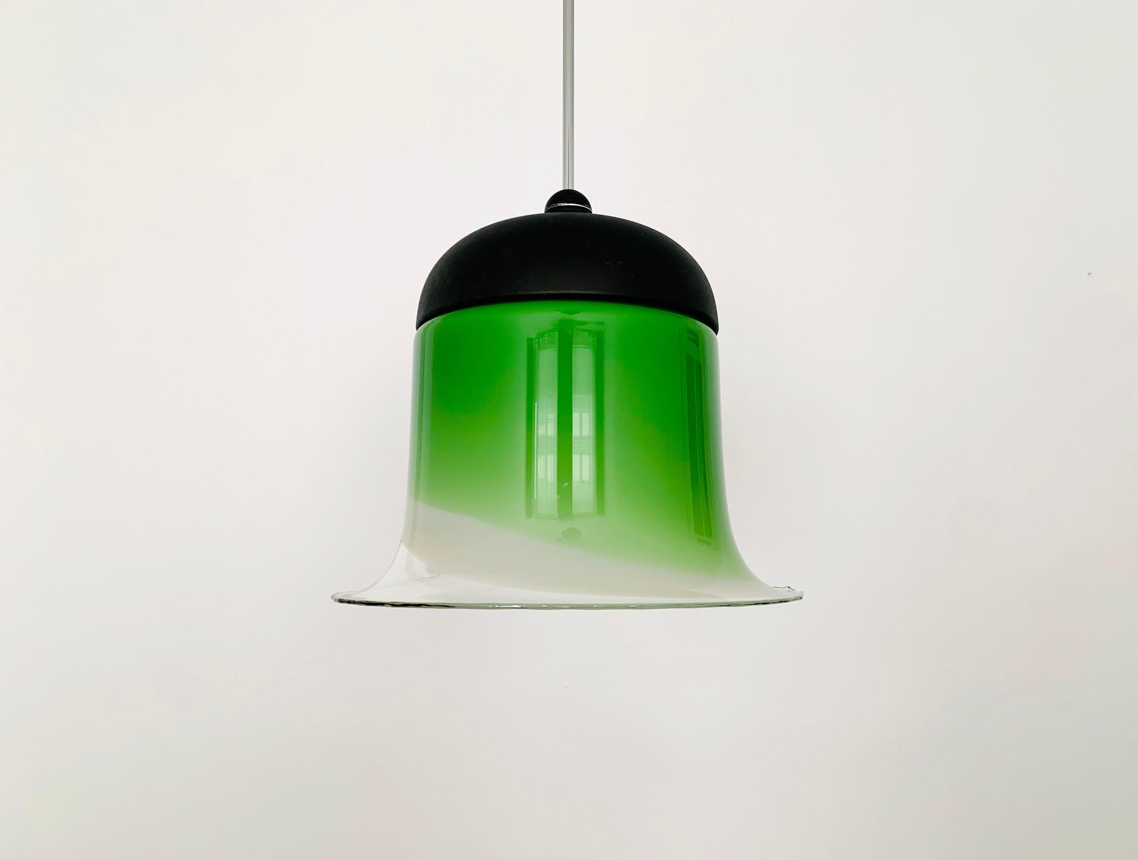 Exceptionally beautiful glass pendant lamp from the 1980s.
Very fine and beautiful design that fits wonderfully into any room.
The high-quality glass creates a beautiful and very comfortable light.

Manufacturer: Peill and Putzler

Condition:

Very