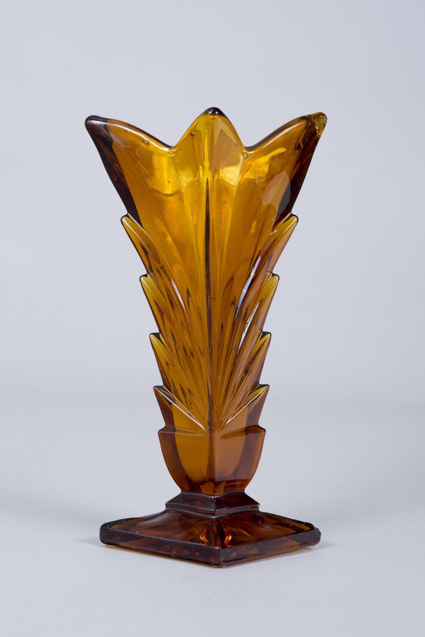 Made in the 1930s out of cast glass in Bohemia, now Czech Republic.