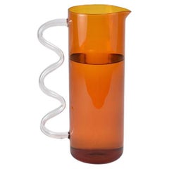 Glass Pitcher in Amber with a Clear Wavy Handle
