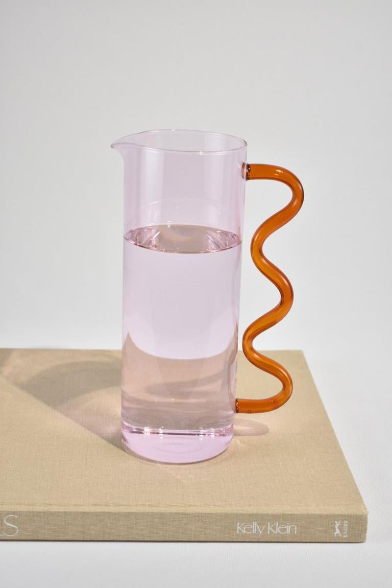 American Glass Pitcher in Pink with an Amber Wavy Handle