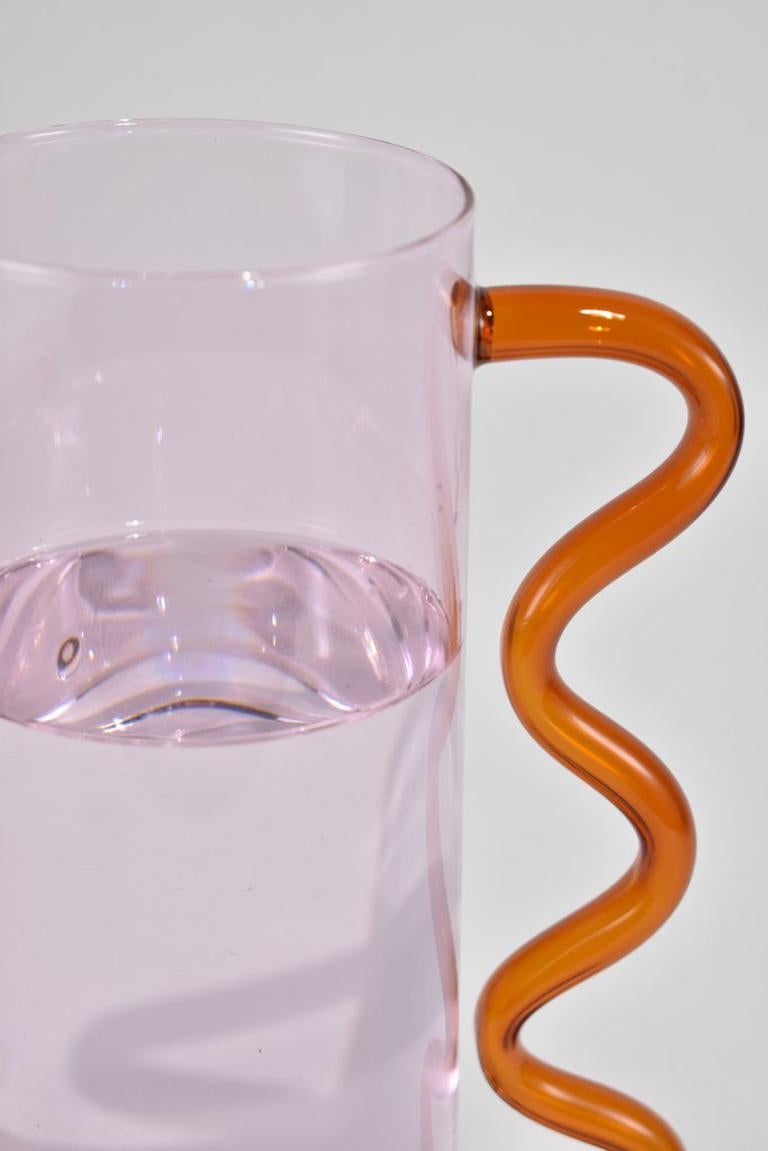 Hand-Crafted Glass Pitcher in Pink with an Amber Wavy Handle