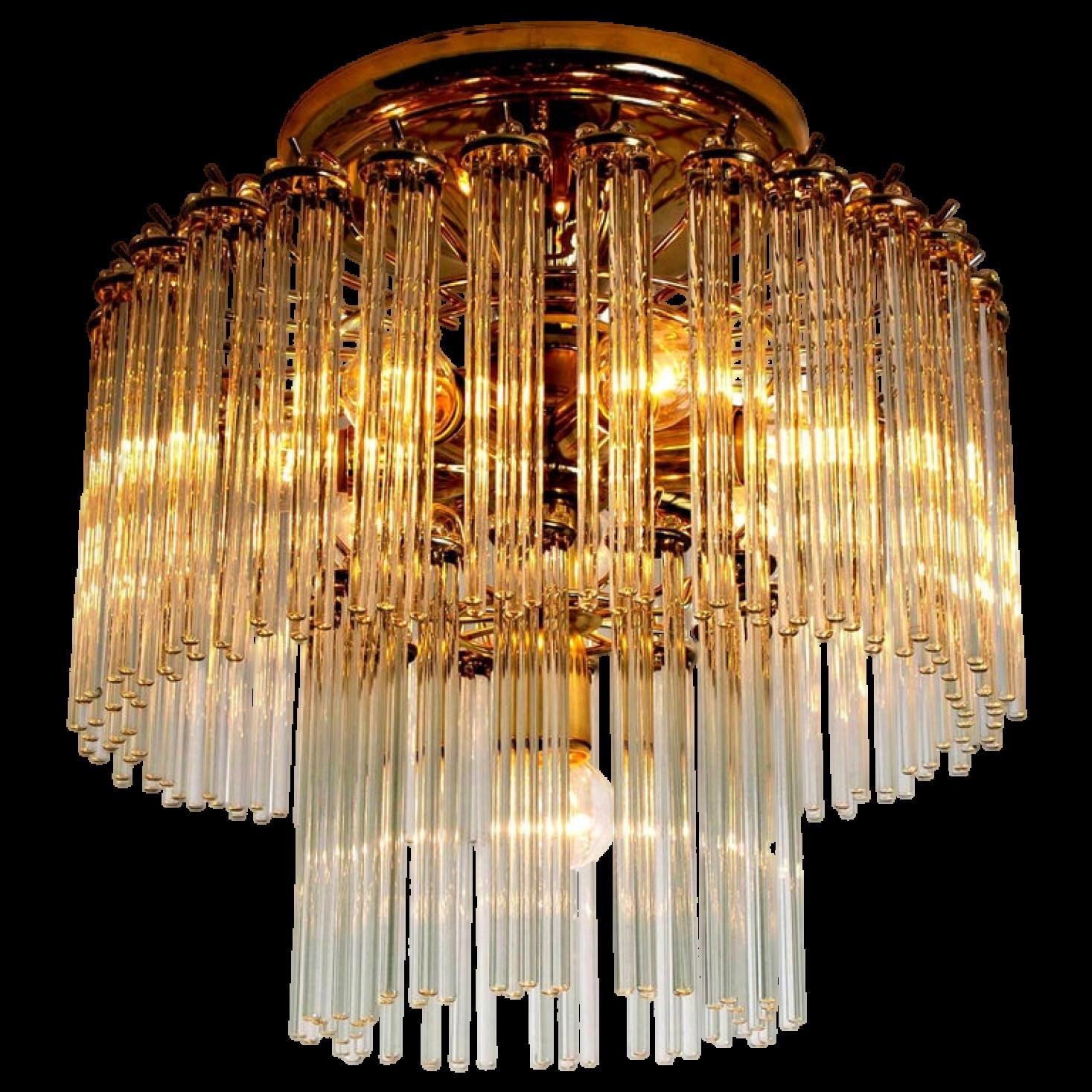 A Italian Mid-Century Modern glass rod and brass Gaetano Sciolari flush mount for Lightolier, circa 1960s-1970s. Illuminates beautifully.
With 48 pierced round form clusters of light catching optical quality glass rods (7.1 inch) sitting on a brass