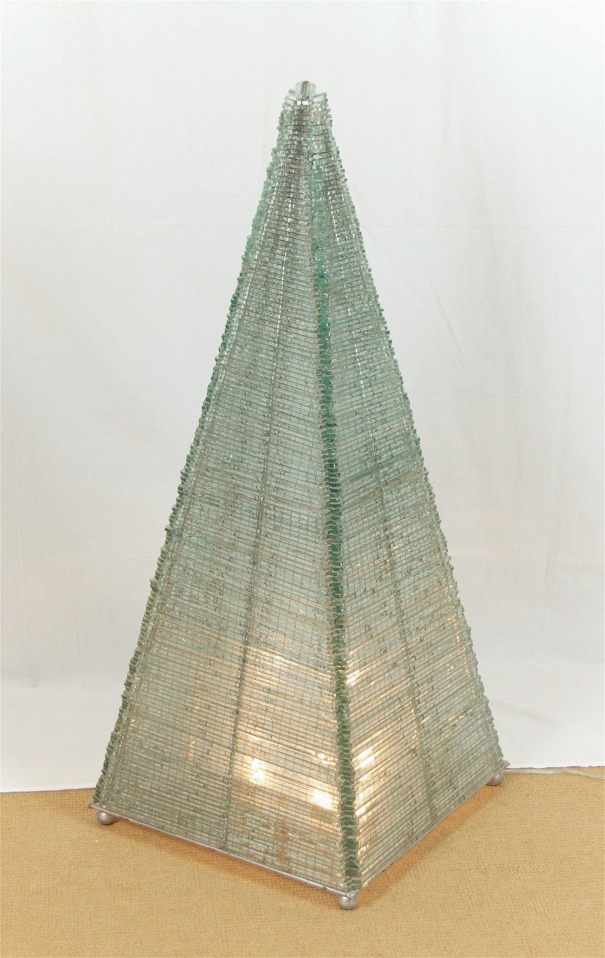 Dramatic and unusual light sculpture. Amazing detail with miniature elongated cubes of clear glass individually sewn to each other by thin silver wire. A wonderful one-of-a-kind piece.
