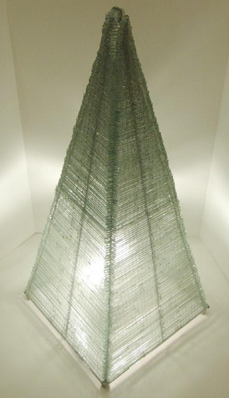 Dramatic and unusual light sculpture. Amazing detail with miniature elongated cubes of clear glass individually sewn to each other by thin silver wire. A wonderful one-of-a-kind piece.