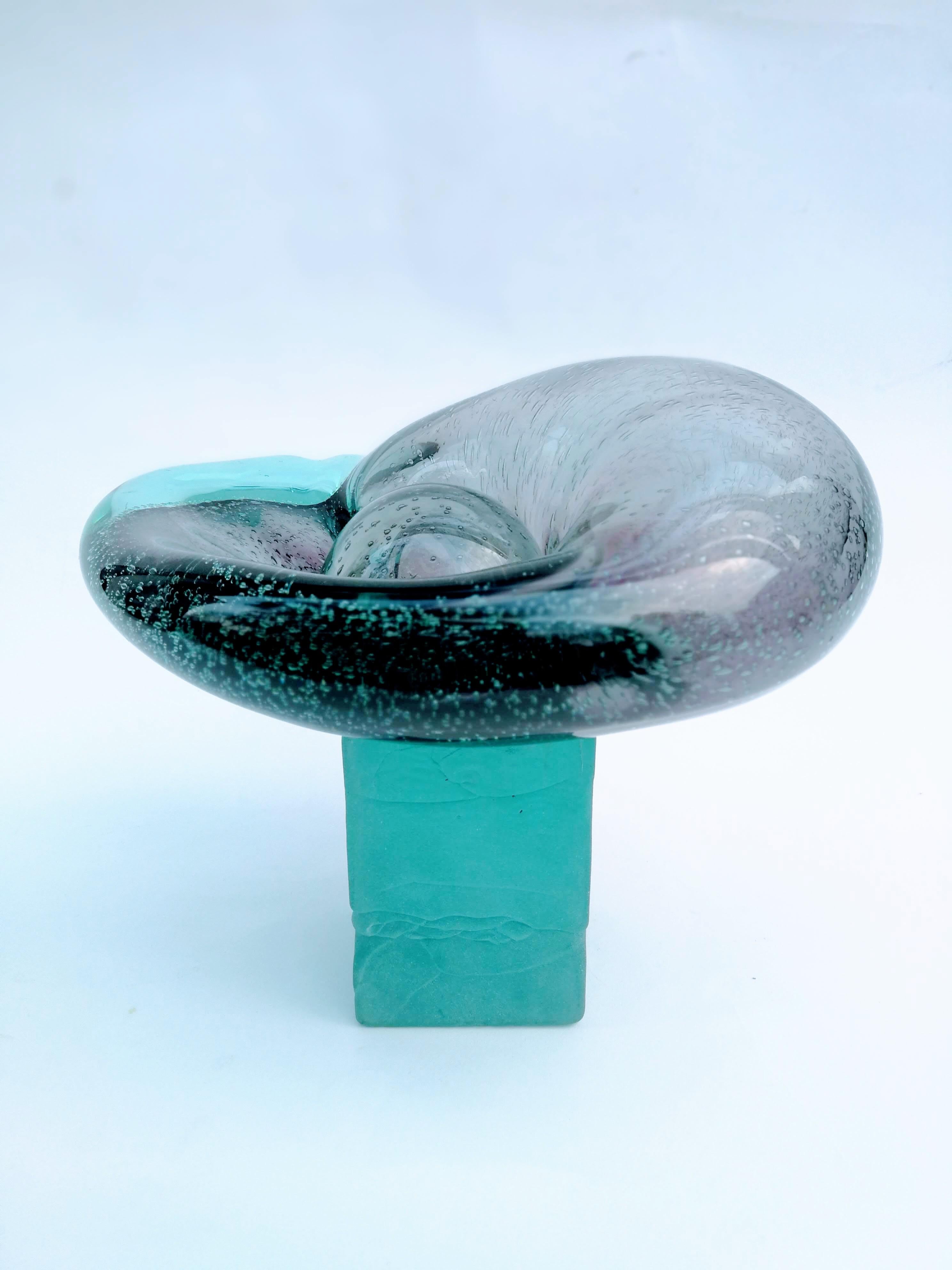 Contemporary sculpture inspired by organic forms, by Cwetan Caczew - Polish artist of Bulgarian origin.

Made in layer glass colored mass in anthracite (inner layer) and blue (outer layer). The sculpture has a concentric, expressive and spatially