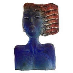 Glass Sculpture of a Woman Bust on a Metal Pedestal