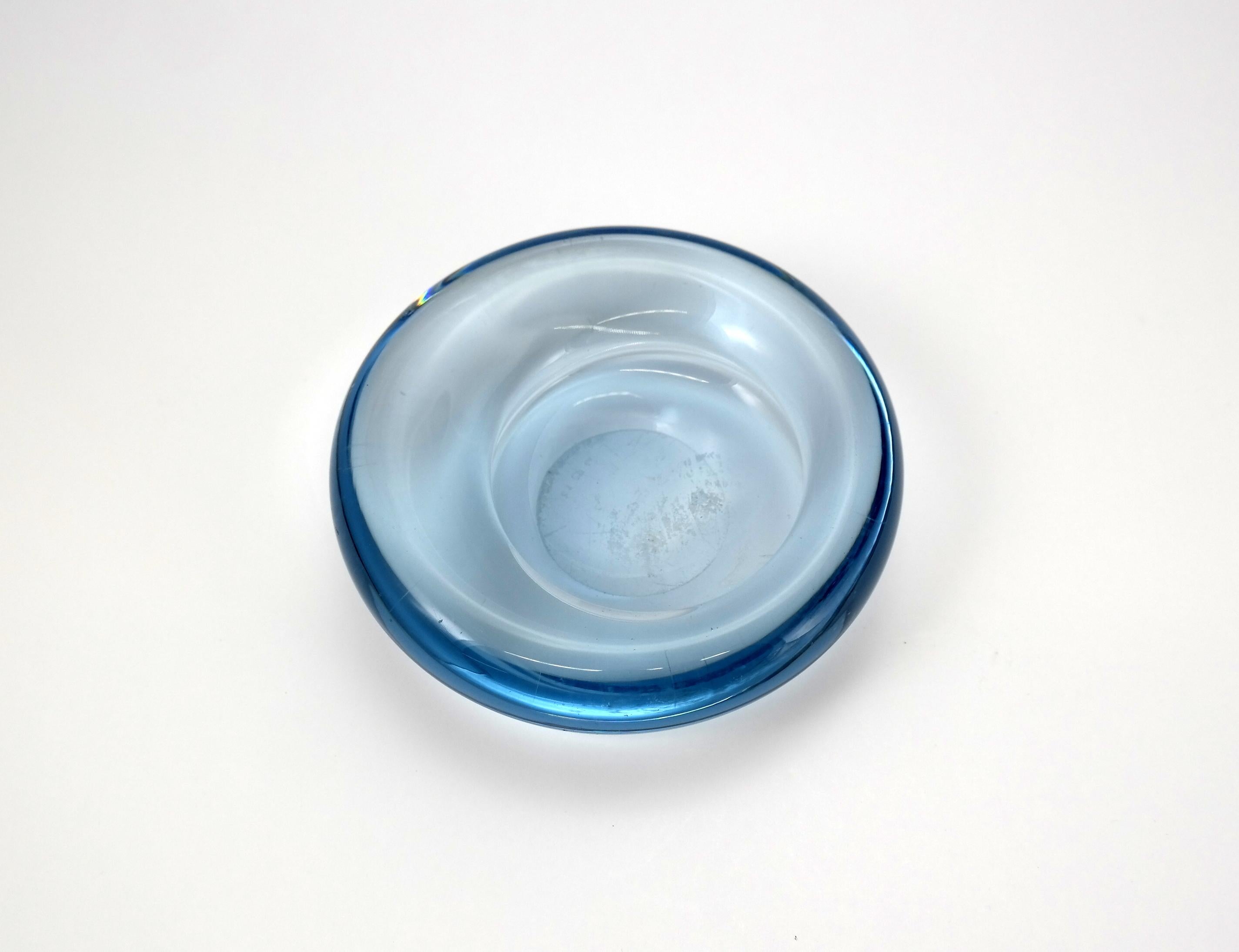 Glass shell bowl by Per Lutken for Holmegaard, Denmark, 1960s
Wonderful heavy glass decorative dish designed by Per Lütken and produced by Holmegaard in Denmark in the 1960s. 

  
     