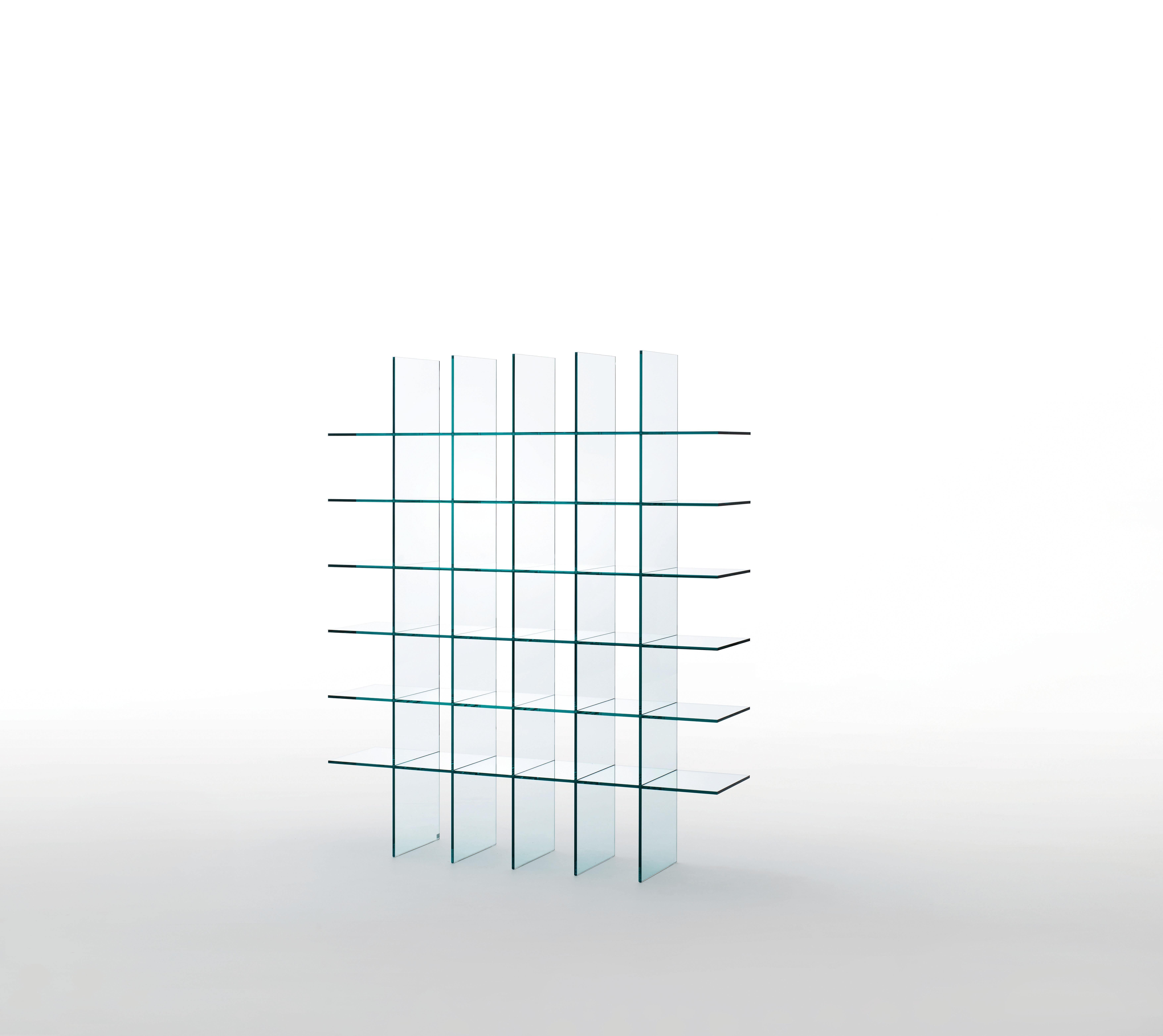 Glass Shelves #1 (1976) Shelves is shown here in the transparent glass. Bookcase characterised by the extraordinary formal cleanness and the golden proportions, entirely realized in thermo-welded mm. 12 thick transparent glass, without the aid of