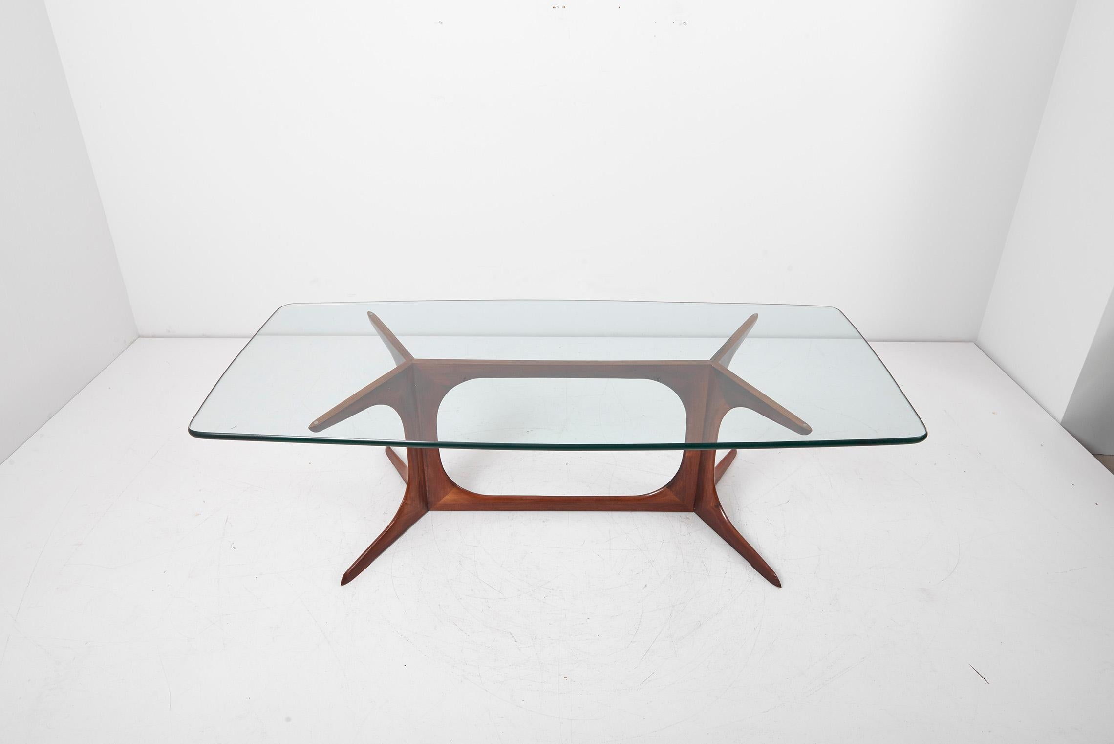 Glass side or coffee table, Denmark 1960s in very good condition.
The shape is very freeform and highly crafted.
