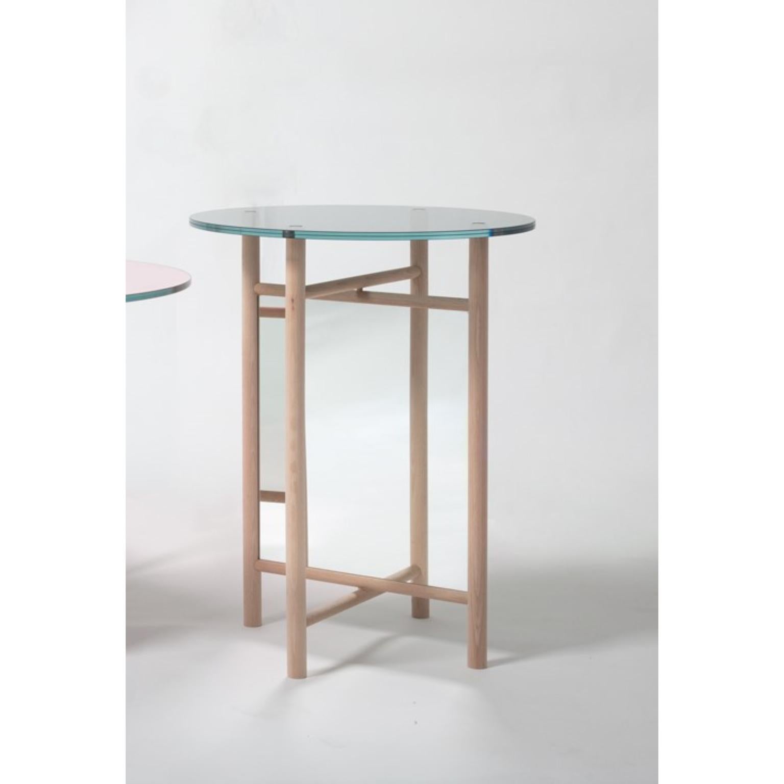 Glass Son Table by Llot Llov
Dimensions: Ø 48 x H 60 cm
Materials: Beech, Mirror, Glass

If you look at the ELIAS and SON tables from afar, the mirrors that are attached within the inner frames are making it seem as if you could see through the