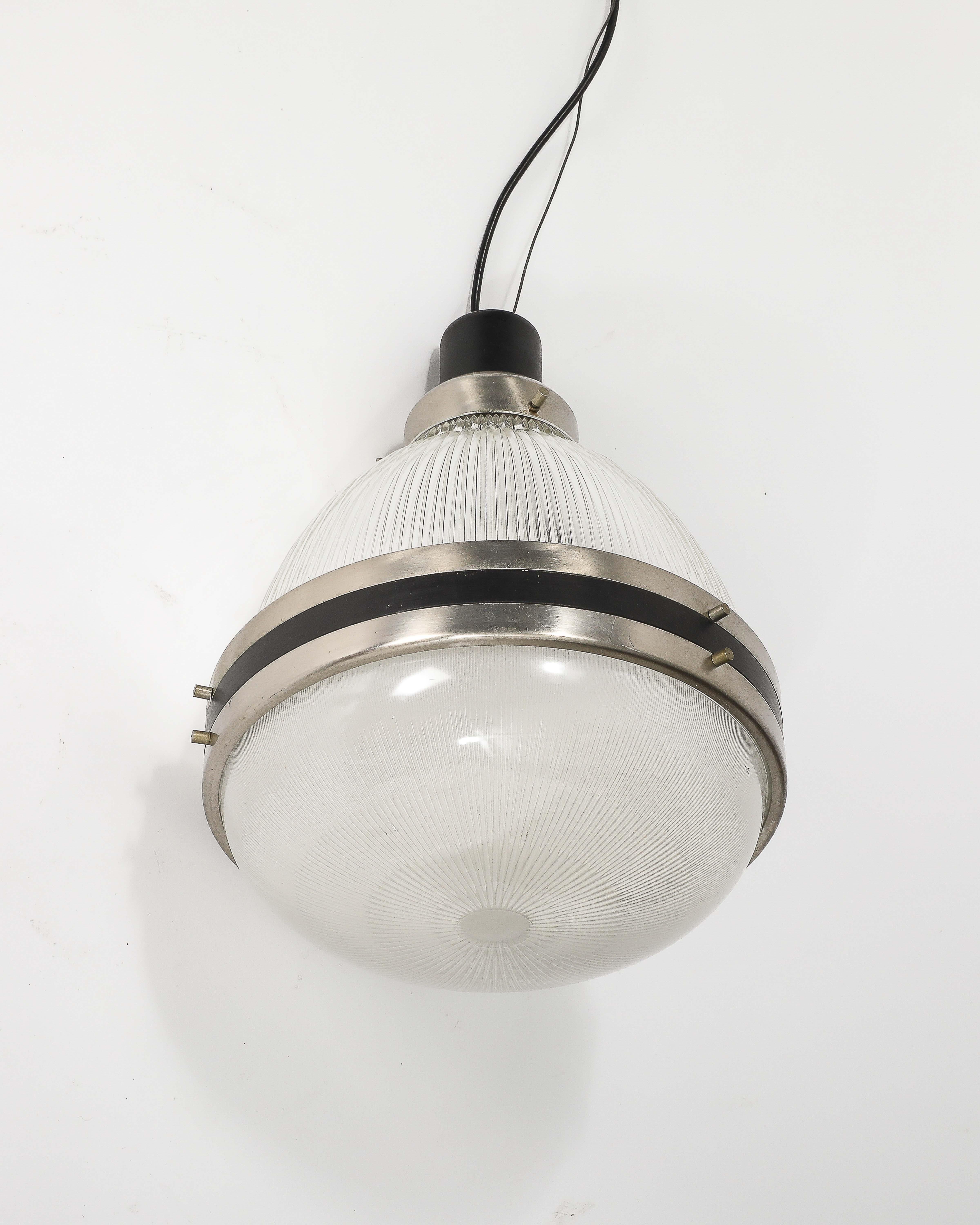 Ciondolo in vetro, acciaio e smalto di B.B.P.R. per Artemide.
