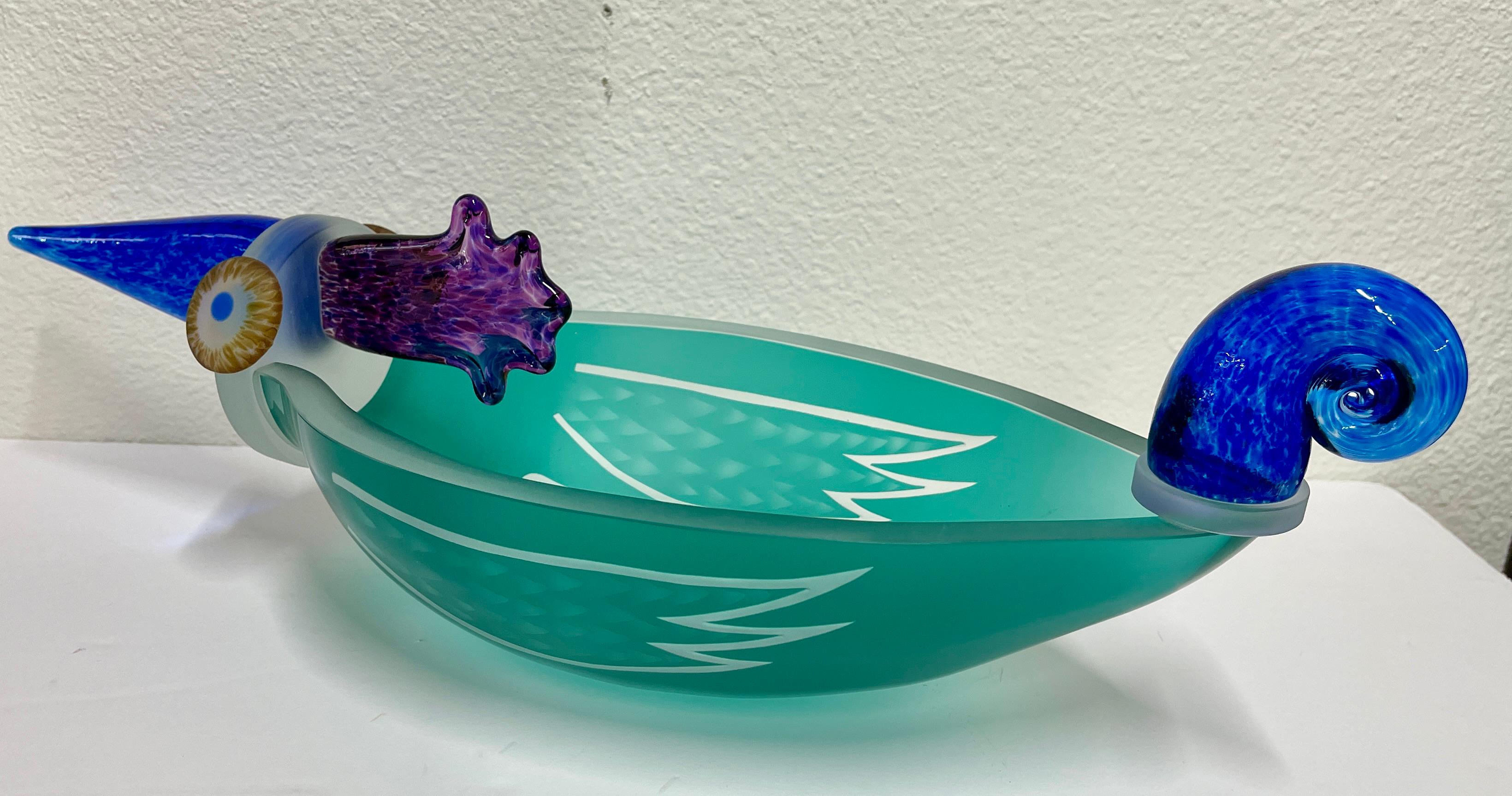 Whimsical art glass piece by the renowned Polish glass studio Borowski. We have a momnumental Stanislaw Borowski piece listed separately. This piece is a cute bird in very good condition. There are a few minor scratches to the base and the label on