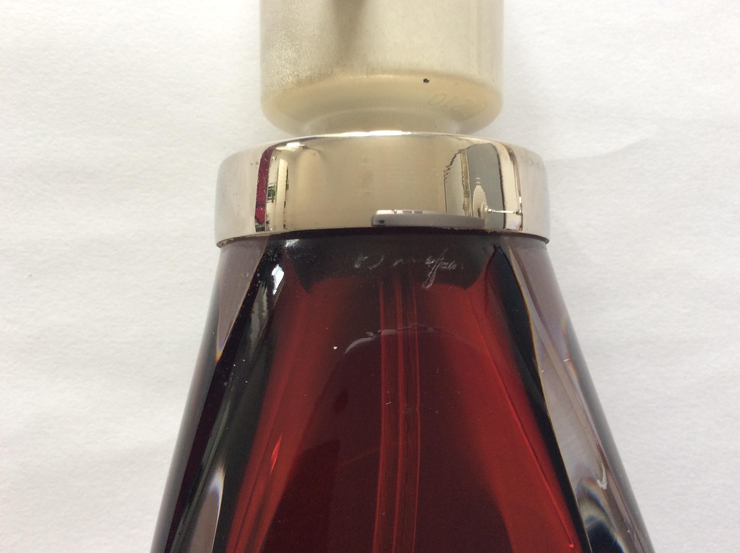 Table lamp, ruby-red with clear glass, designed by Carl Fagerlund.
Produced by Orrefors in Sweden, model RD 1884. Signed at the top. The lamp is offered without shade.
Measurements: Height with socket, circa 36.5 cm.

 