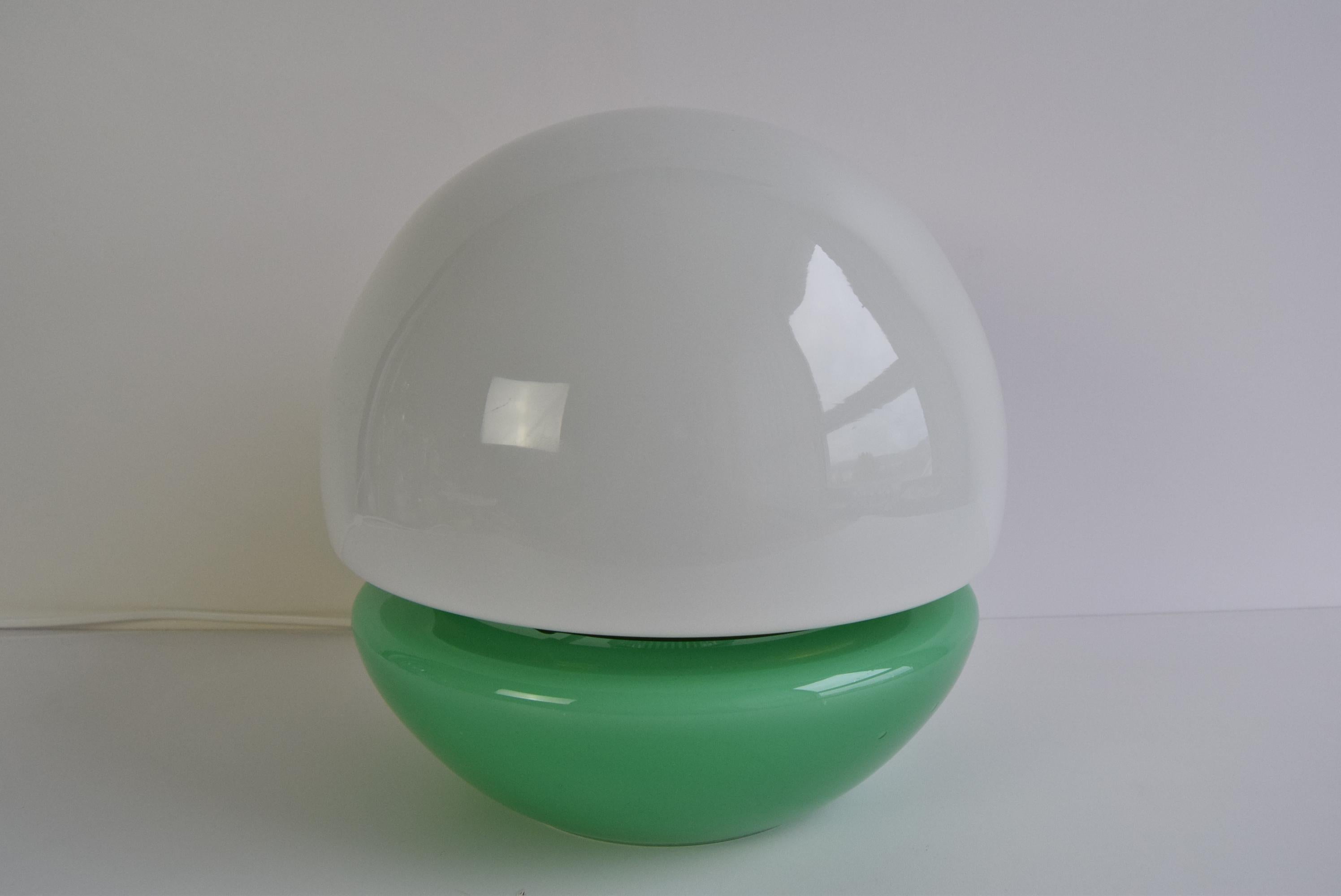The light consists of two all-glass domes, which are connected by a circular decorative brass bracket
The lamp was disassembled, cleaned and polished, the brass part has an aged patina, it is fitted with a new electric cable
American adapter