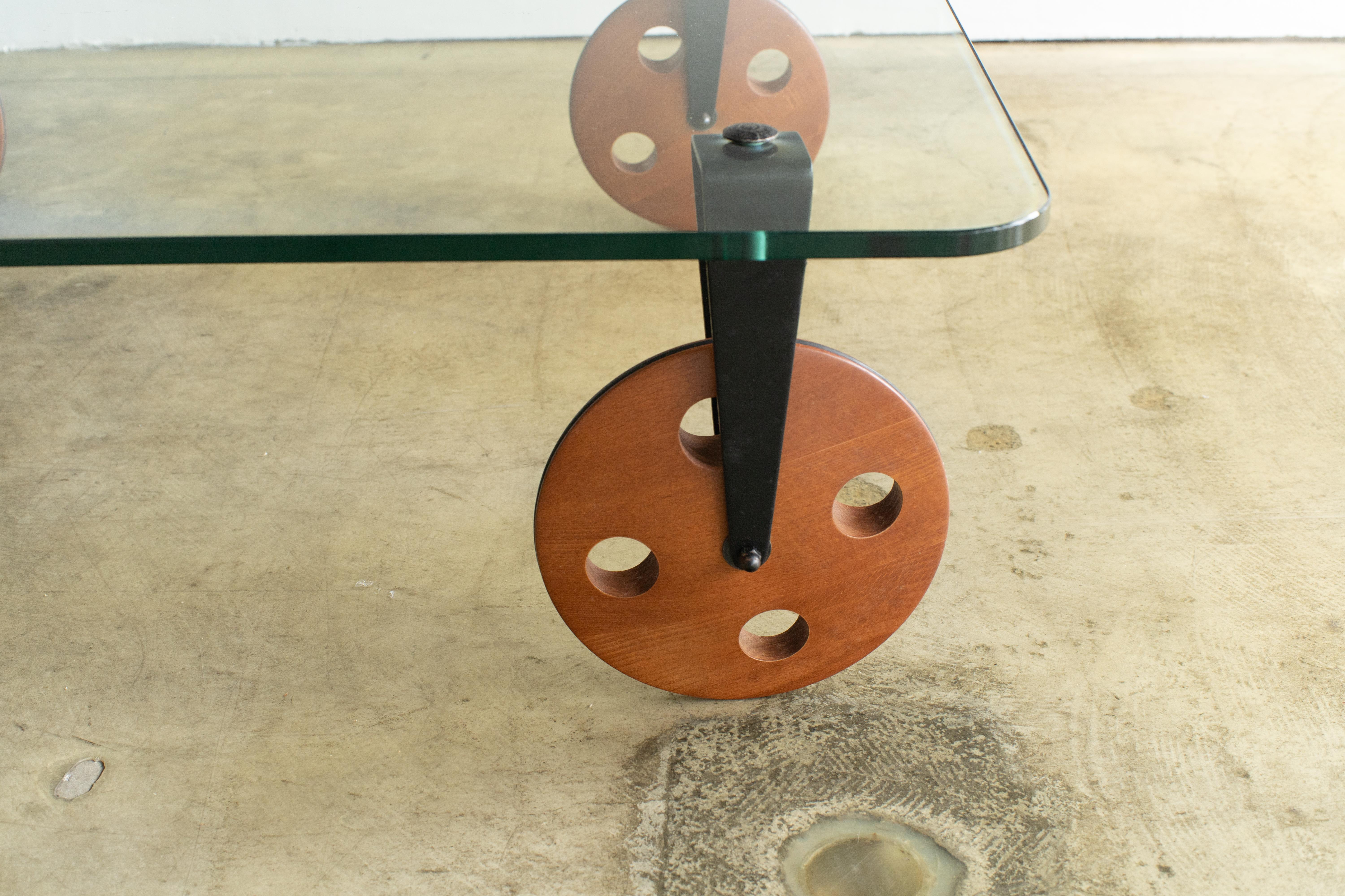Italian Glass Table with Wood Wheels Gae Aulenti Style