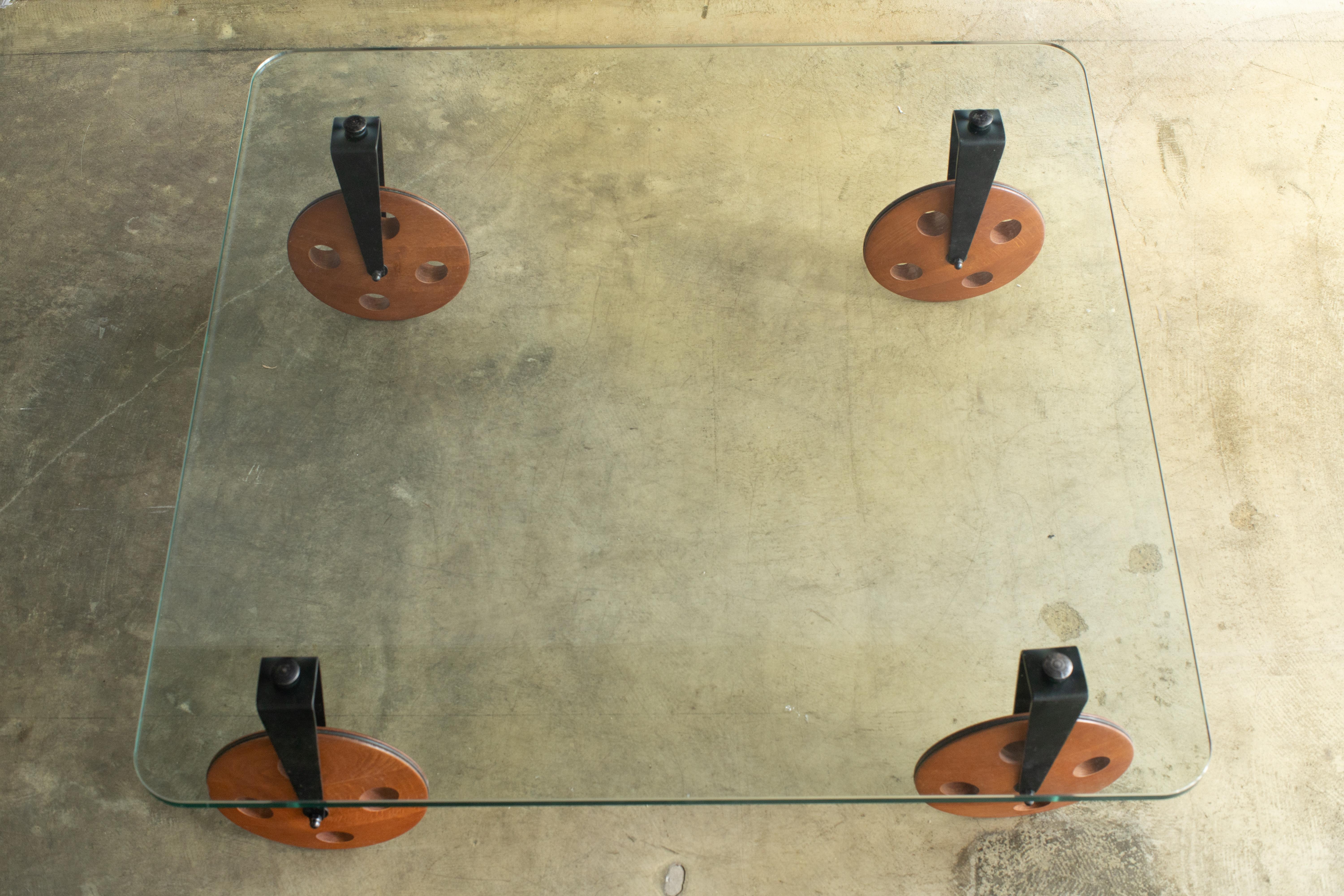 Late 20th Century Glass Table with Wood Wheels Gae Aulenti Style