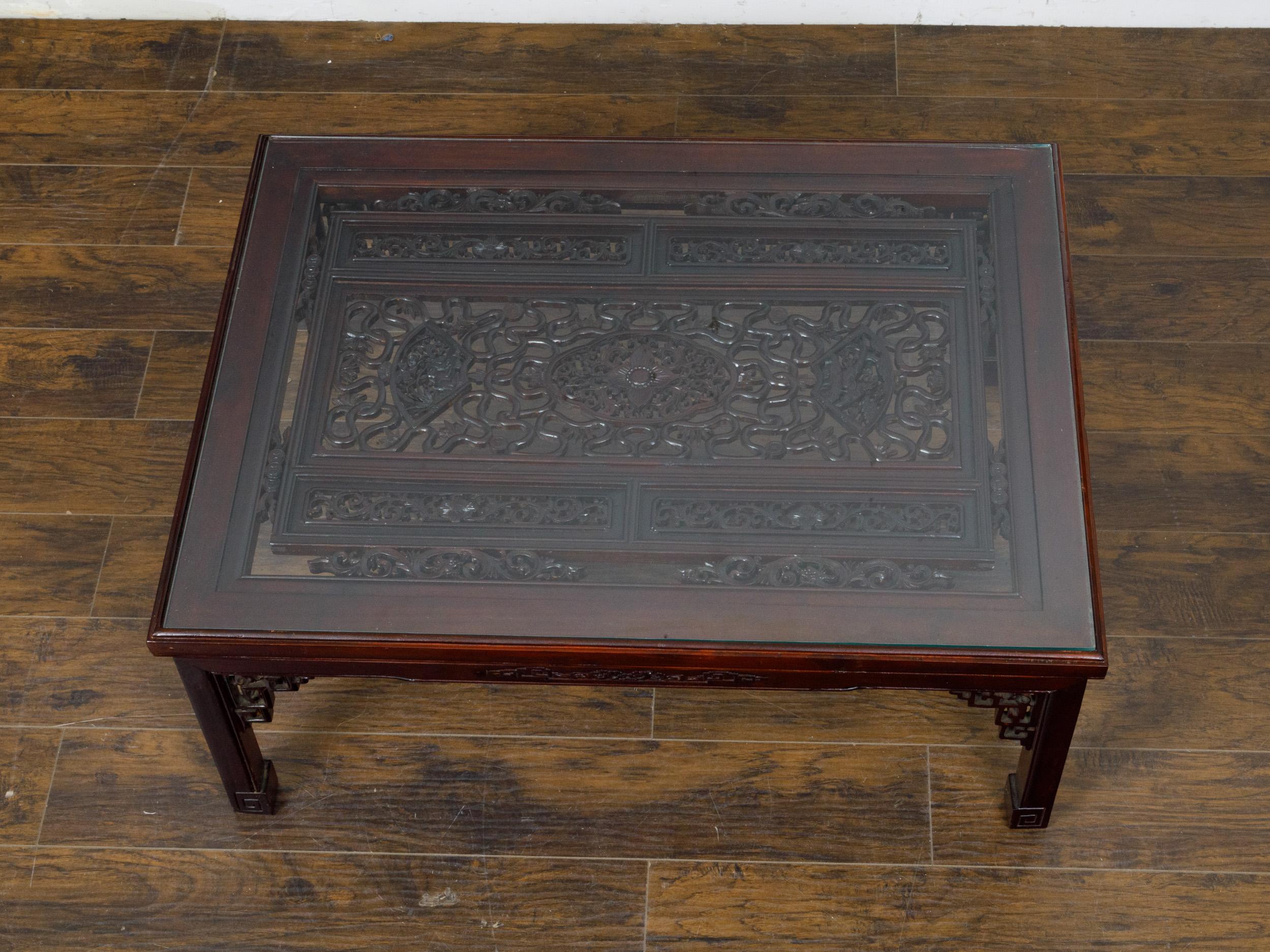Glass Top Coffee Table with Fretwork Motifs and Scrolling Feet, circa 1950 For Sale 1