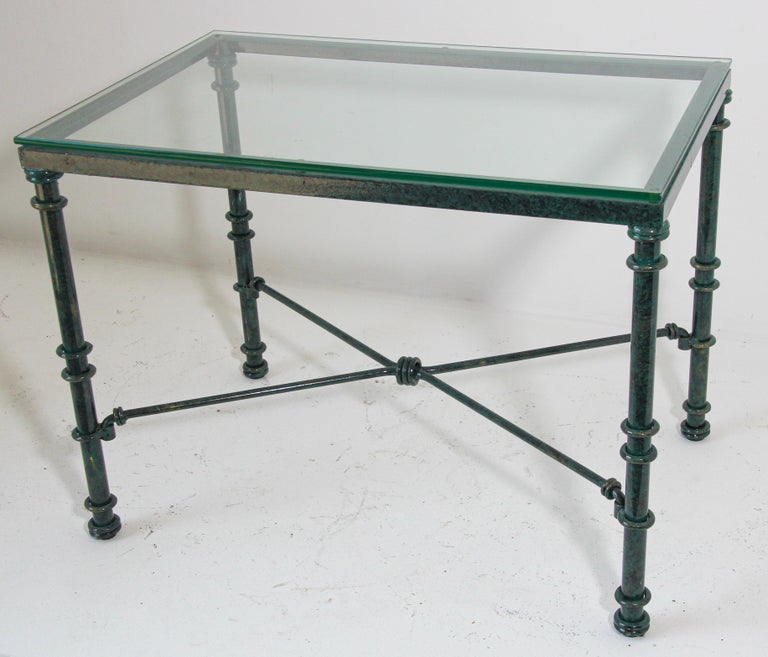 Giacometti inspired metal and glass top coffee table with verdigris style finish patina.
Vintage Diego Giacometti style coffee side table, with patinated painted aluminum forged base with a removable center 
