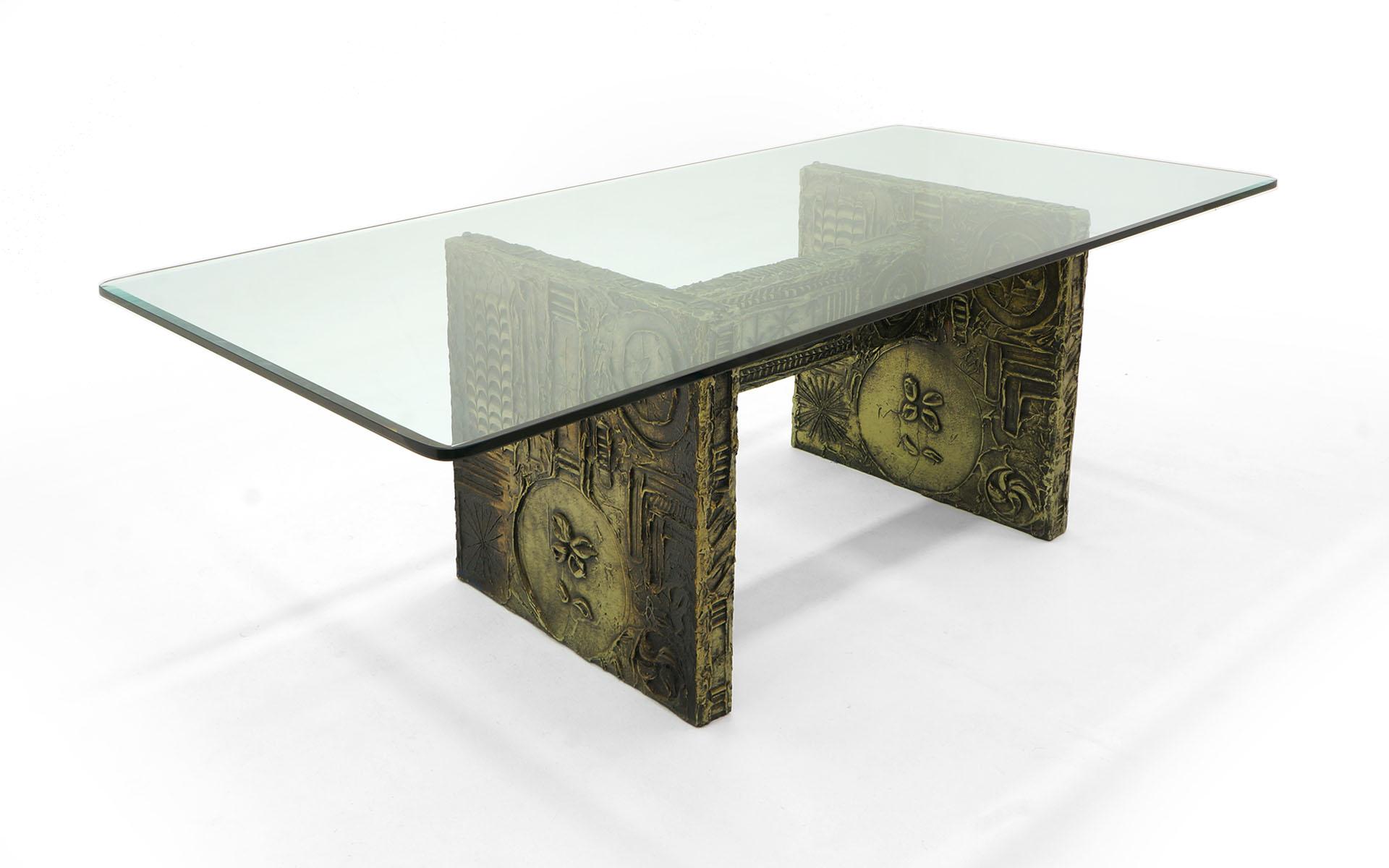 Adrian Pearsall dining table for Craft Associates. Half inch thick rectangular glass top sits on a brutalist designed base in the style of Paul Evans. The base is heavy, sturdy wood construction with a sculpted applied resin design. Glass is in