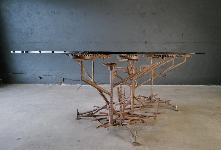 Glass Top Dining Table with One of a Kind Steel Rebar Base For