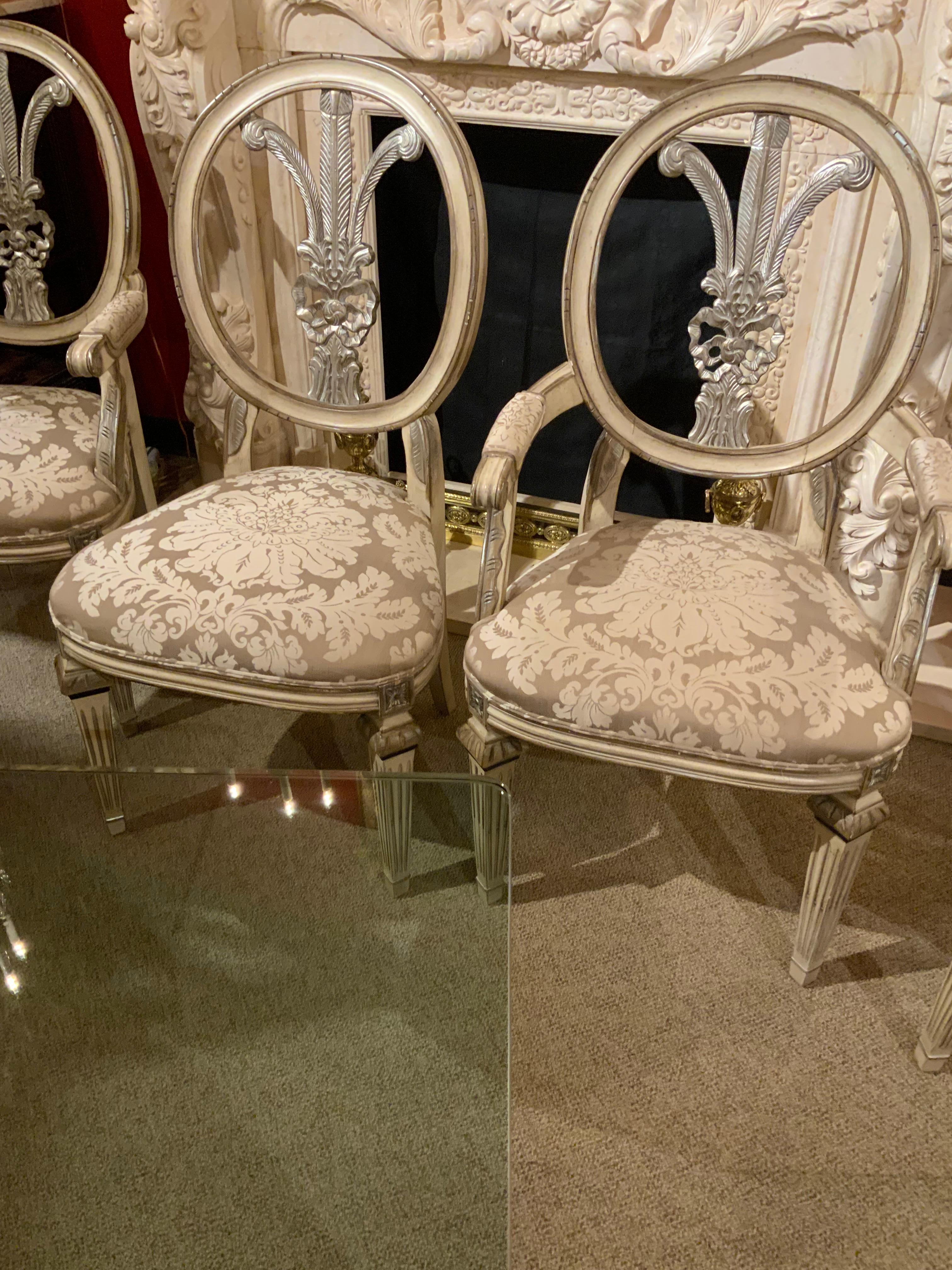 Glass top on silver gilt double pedestal base with ten chairs In Excellent Condition For Sale In Houston, TX