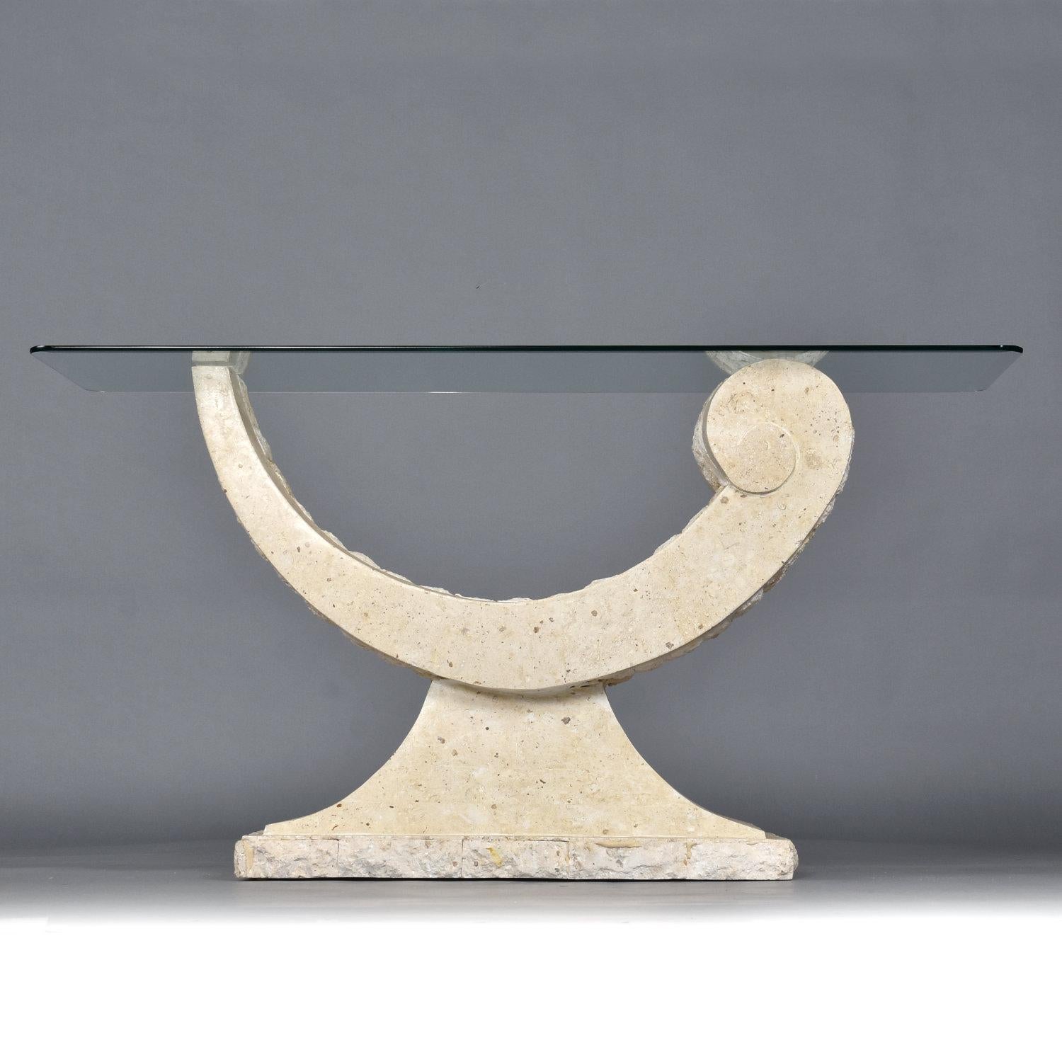 Elegantly curved tessellated stone console table. The table base is made of Mactan stone, a type of coral. It seems fitting that this base made of coral mimics the graceful contour of a seashell. Made in the Philippines, vintage 1980s, the table