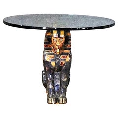 Skulpturaler Tisch mit Glasplatte und Sphinx
