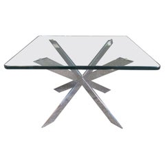 Mesa auxiliar cromada con tapa de cristal