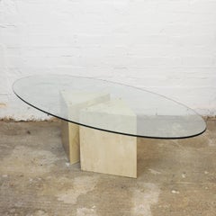 Glass topped Oval Coffee Table on a Travertine and Brass Base, 1980s